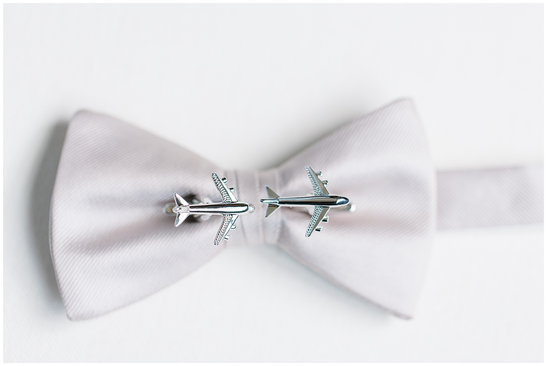 groom bow tie with airplane pin
