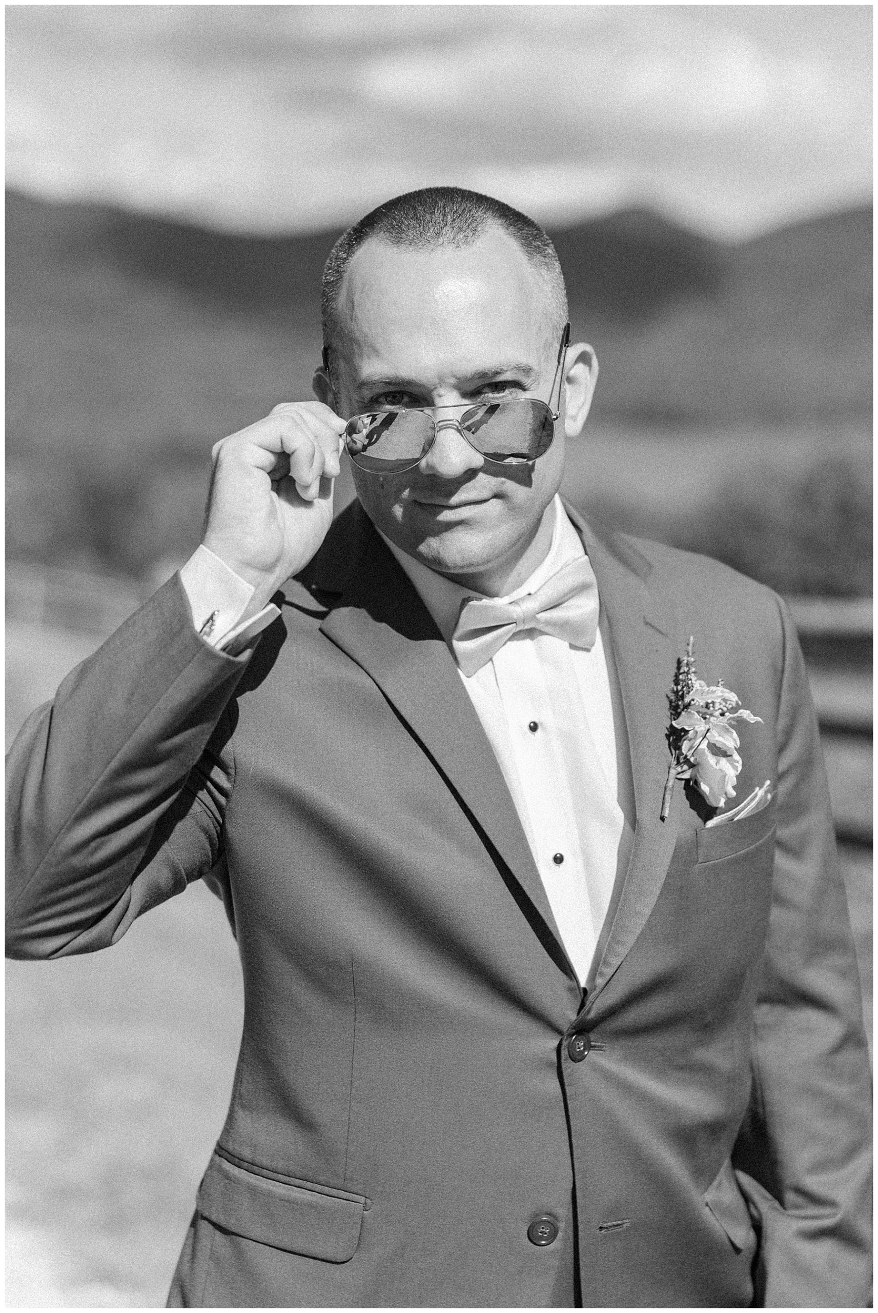 groom portraits with sunglasses