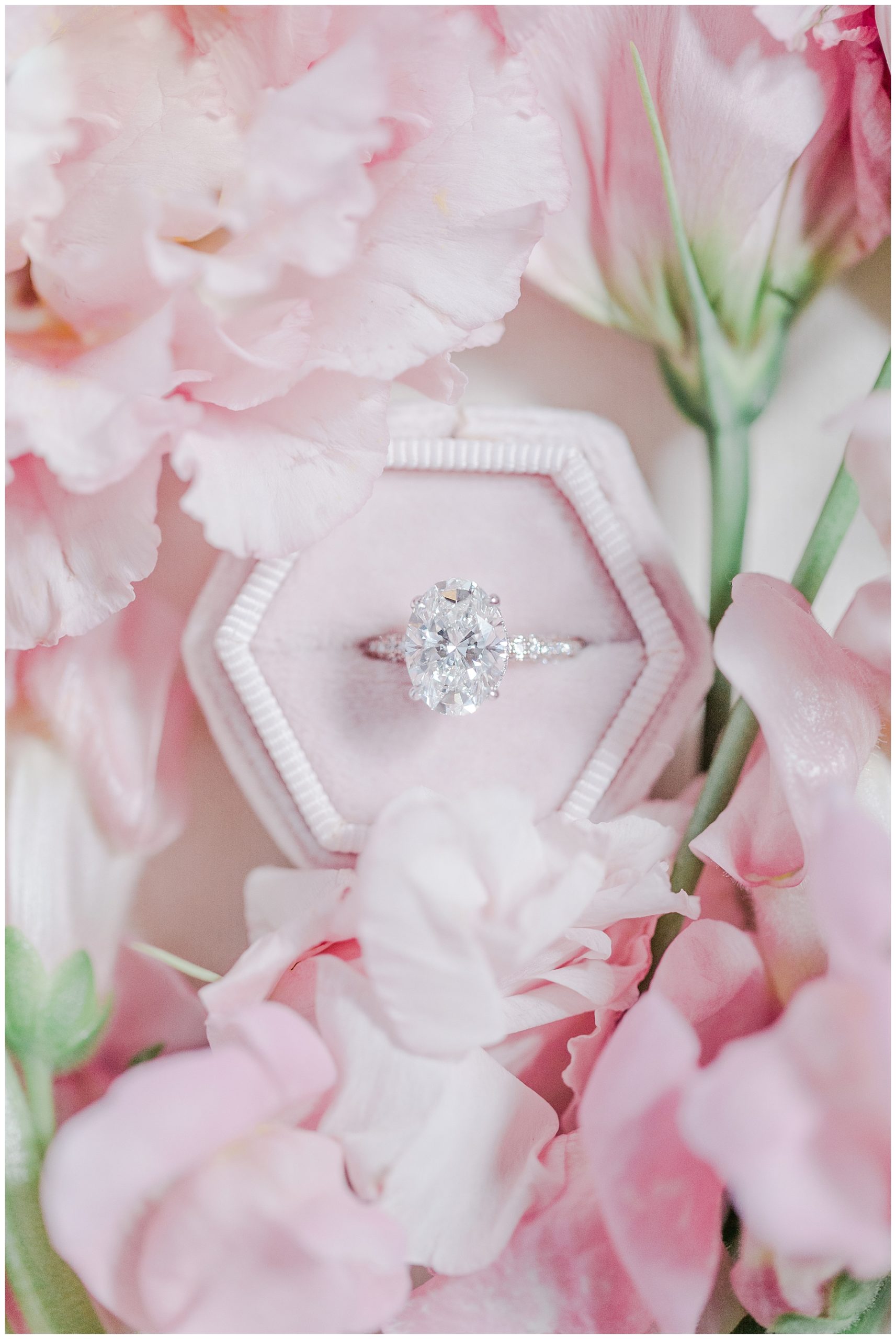 wedding ring in pink ring box