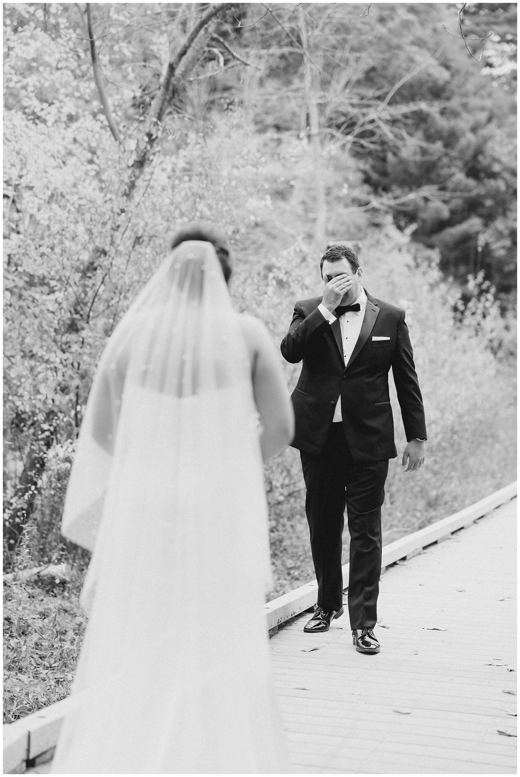 emotional first look moment before Willowdale Estate Fall Wedding 