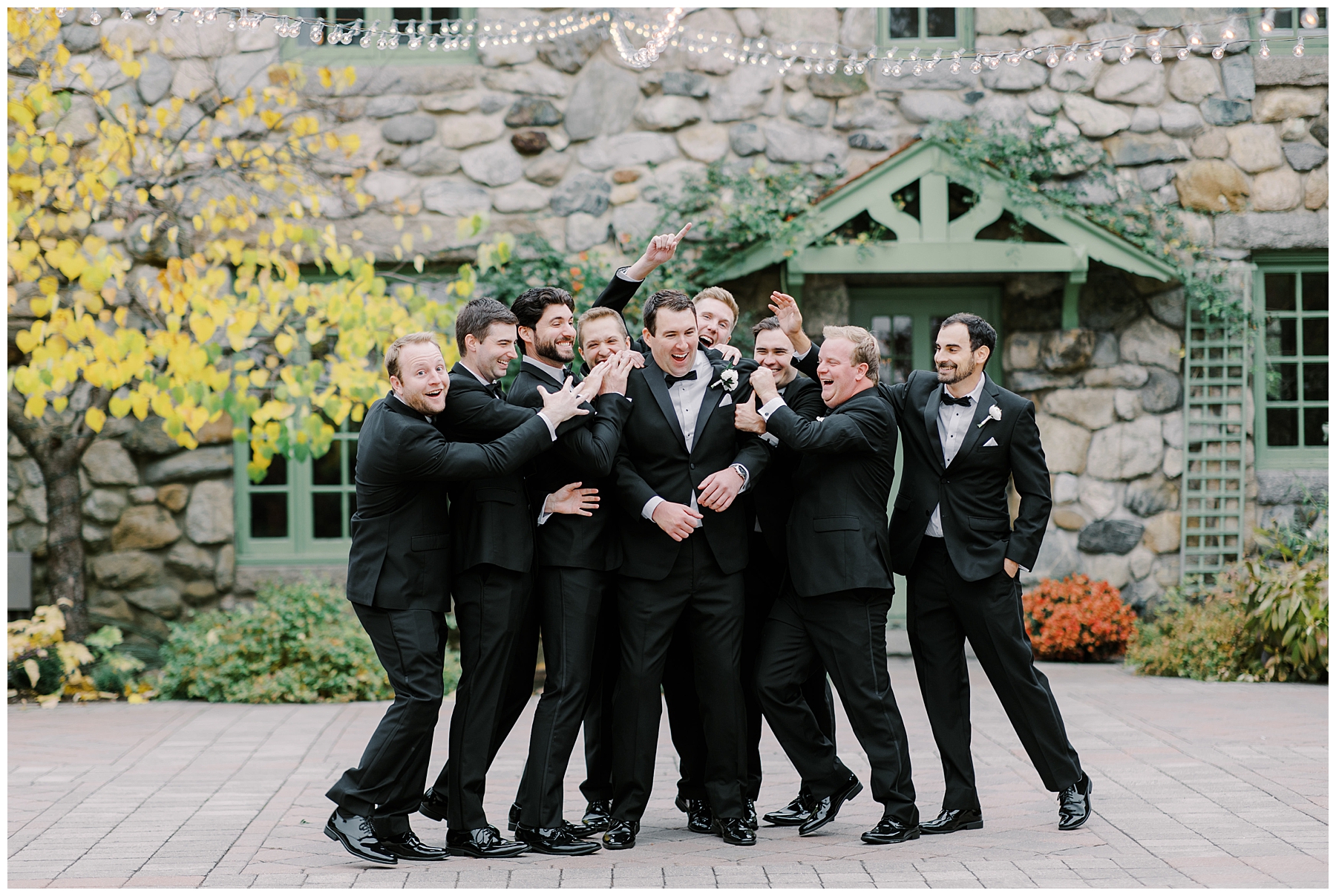 fun and candid portraits of groom and  groomsmen 