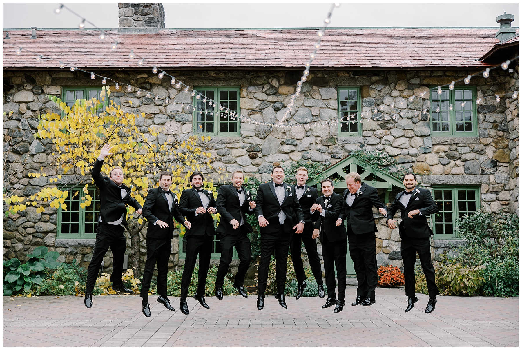 groom and groomsmen jump for active portraits