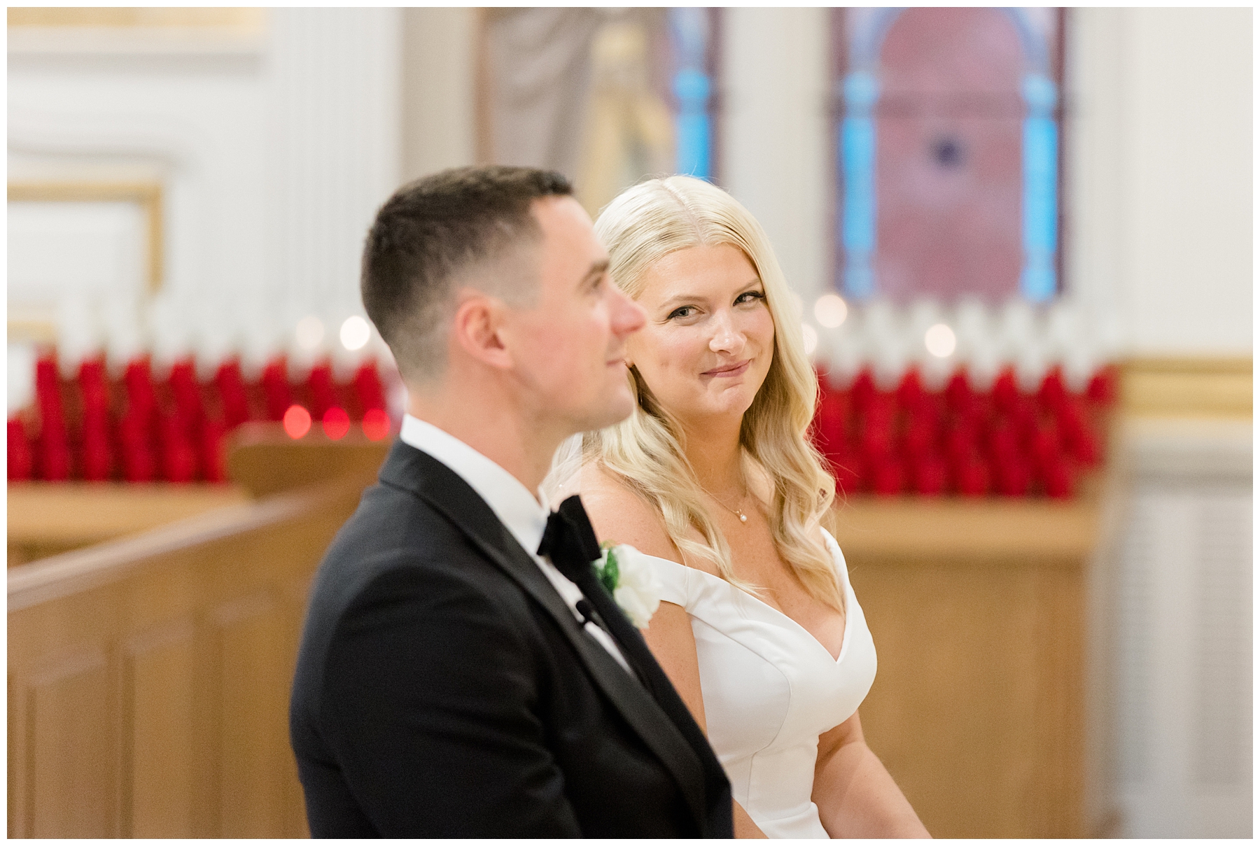 bride looks at groom during wedding ceremony 
