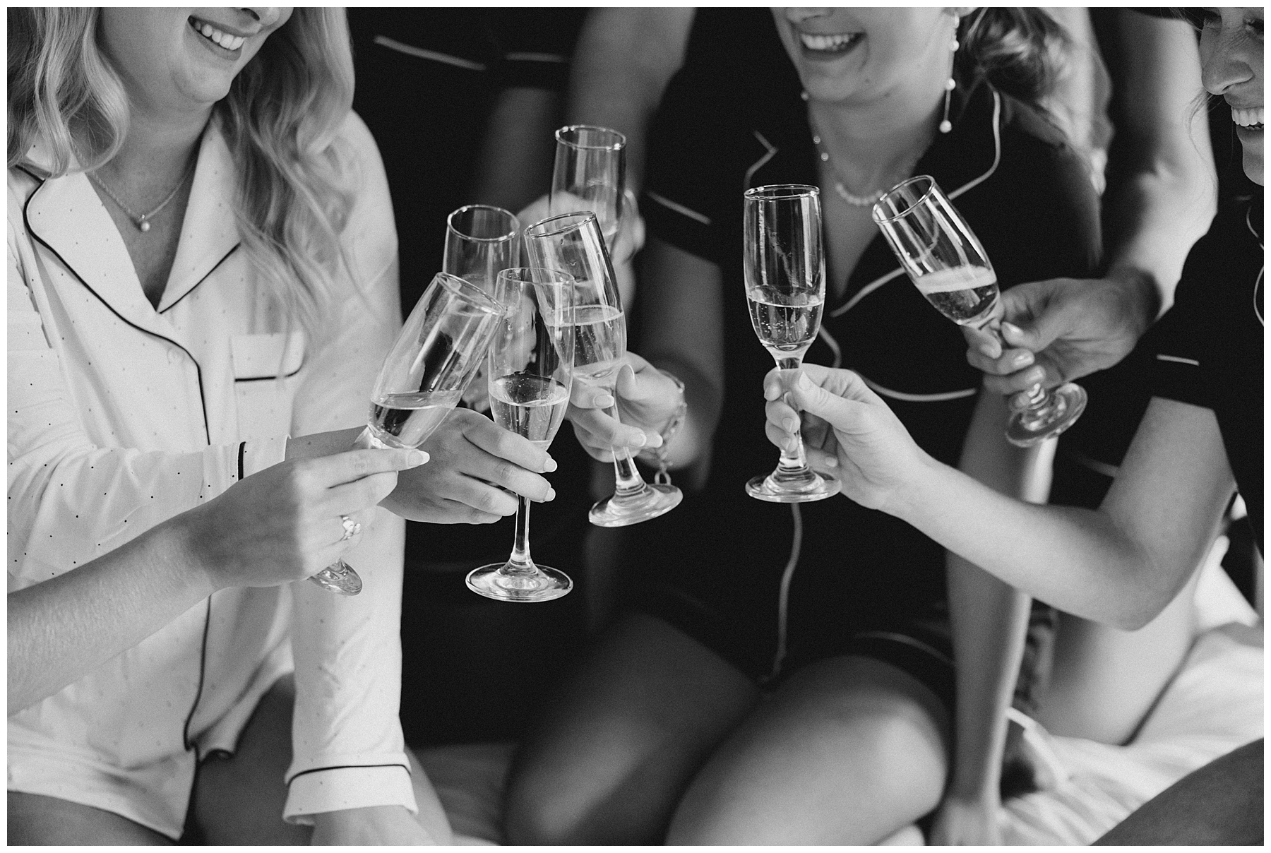 bridesmaids toast with champagne before Boston City Dream Wedding