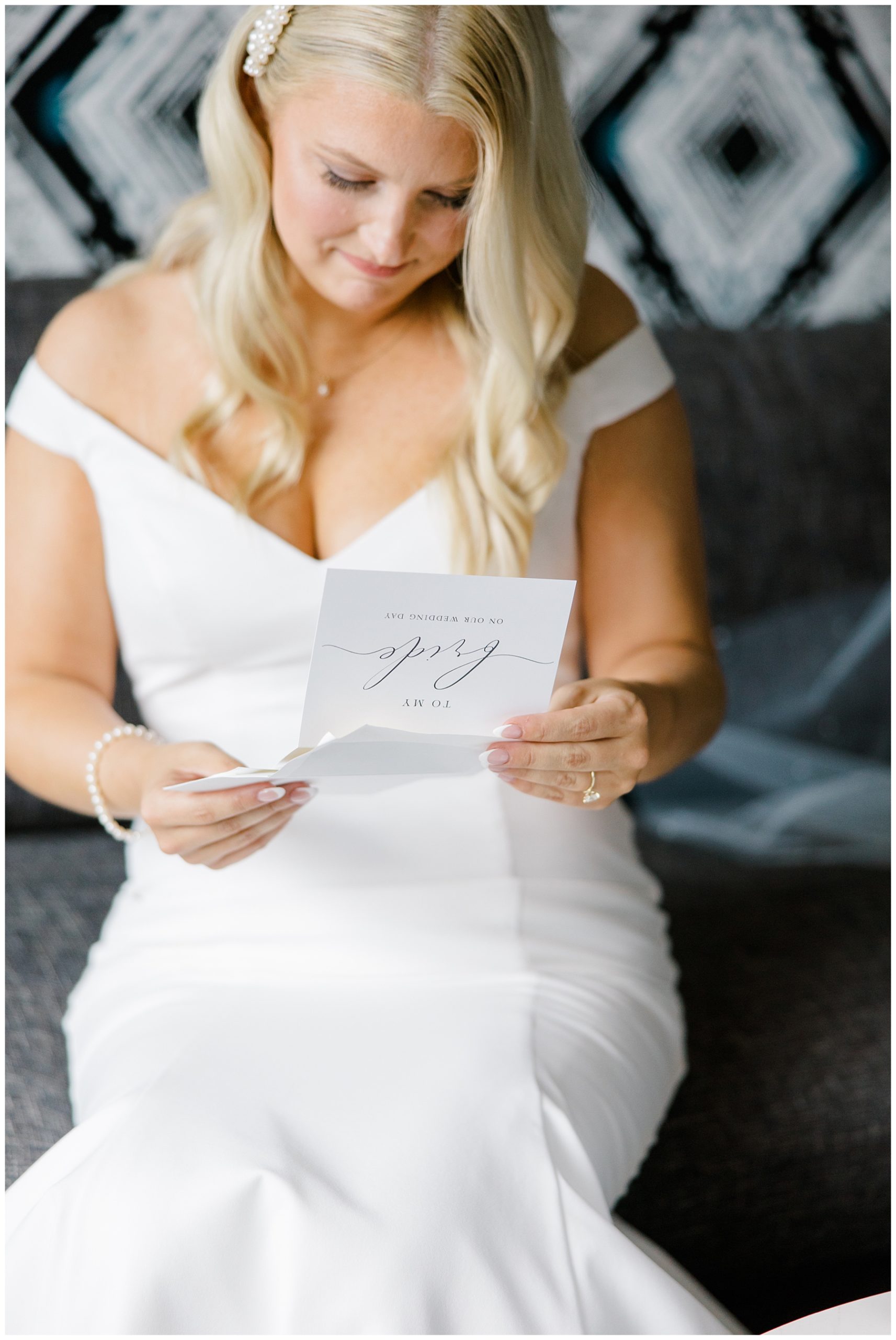 bride reading letter before wedding ceremony 