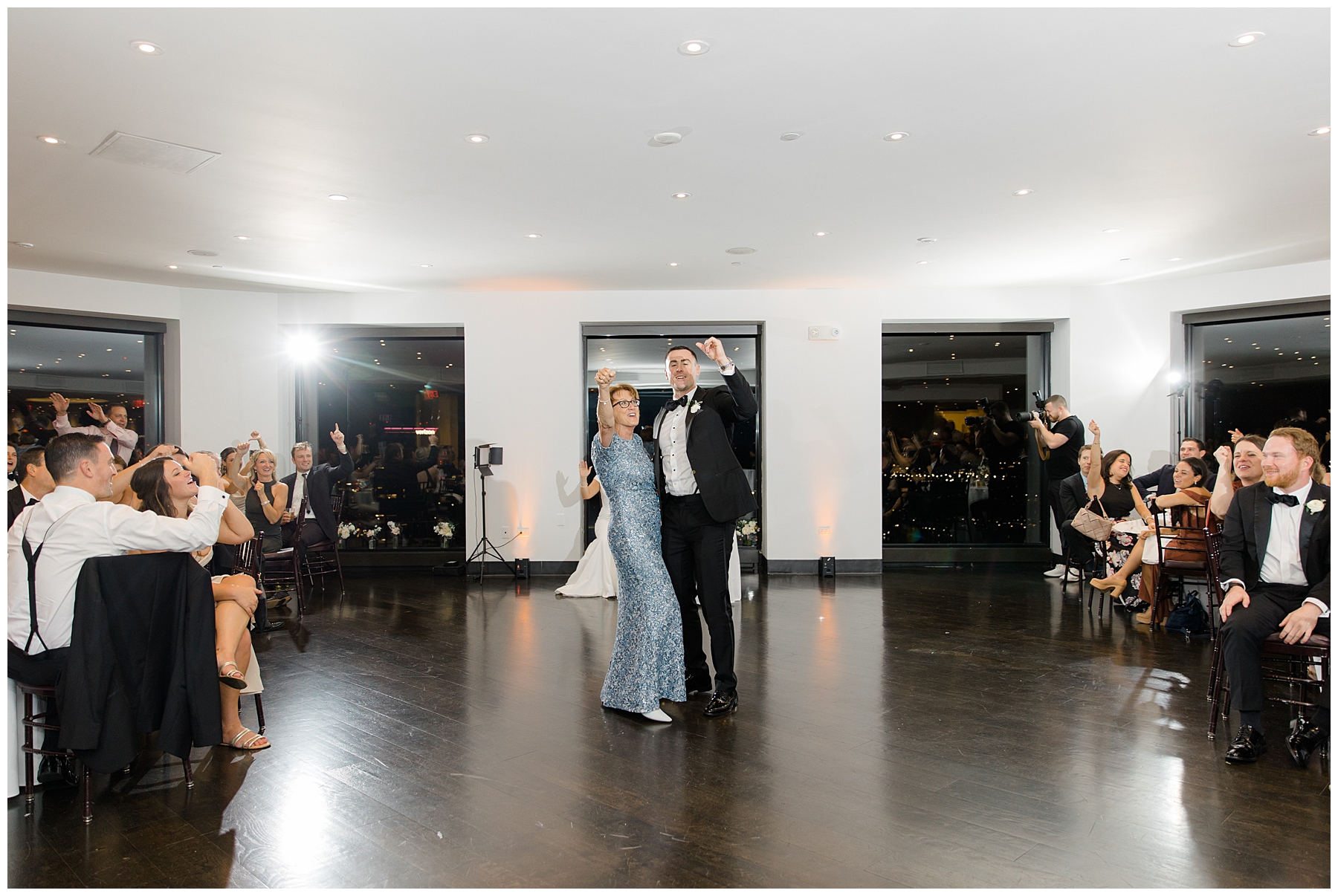 groom and mother have fun on the dance floor