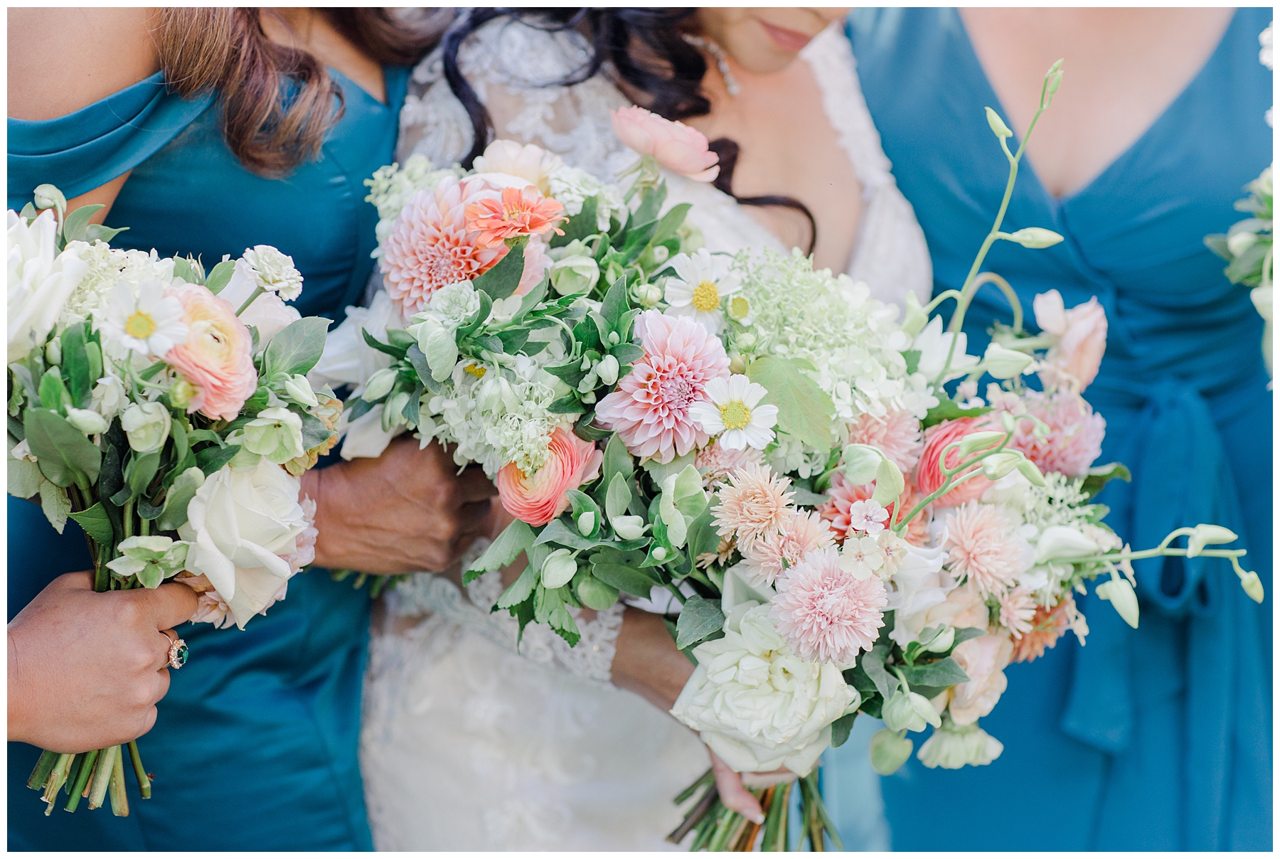 bride and bridesmaids hold bright and elegant wedding bouquets