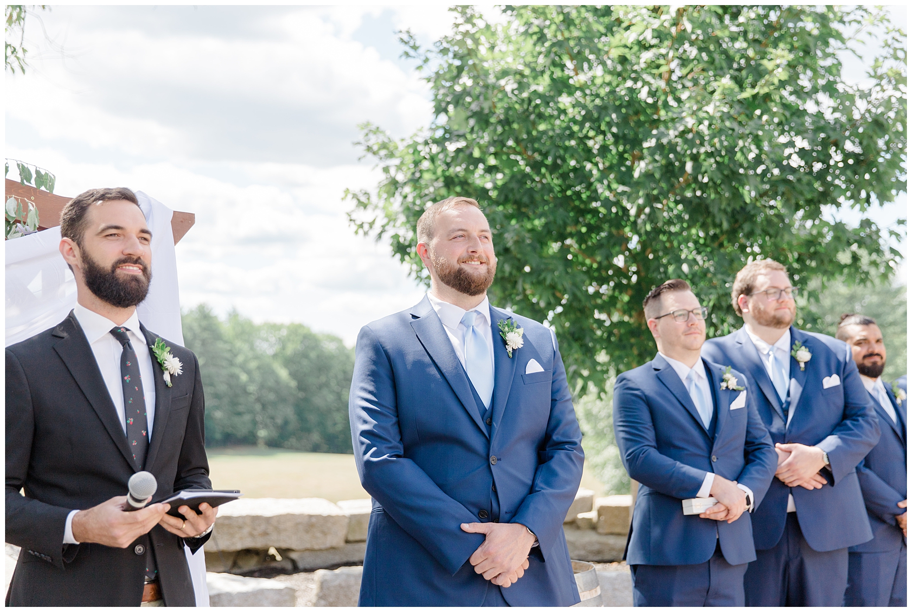 groom sees his bride for the first time during ceremony