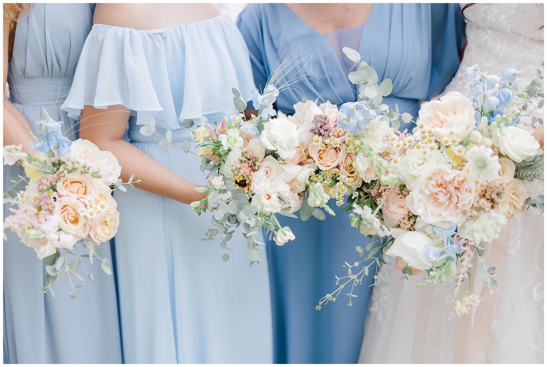 elegant wedding flower bouquets in shades of white, cream, and peach