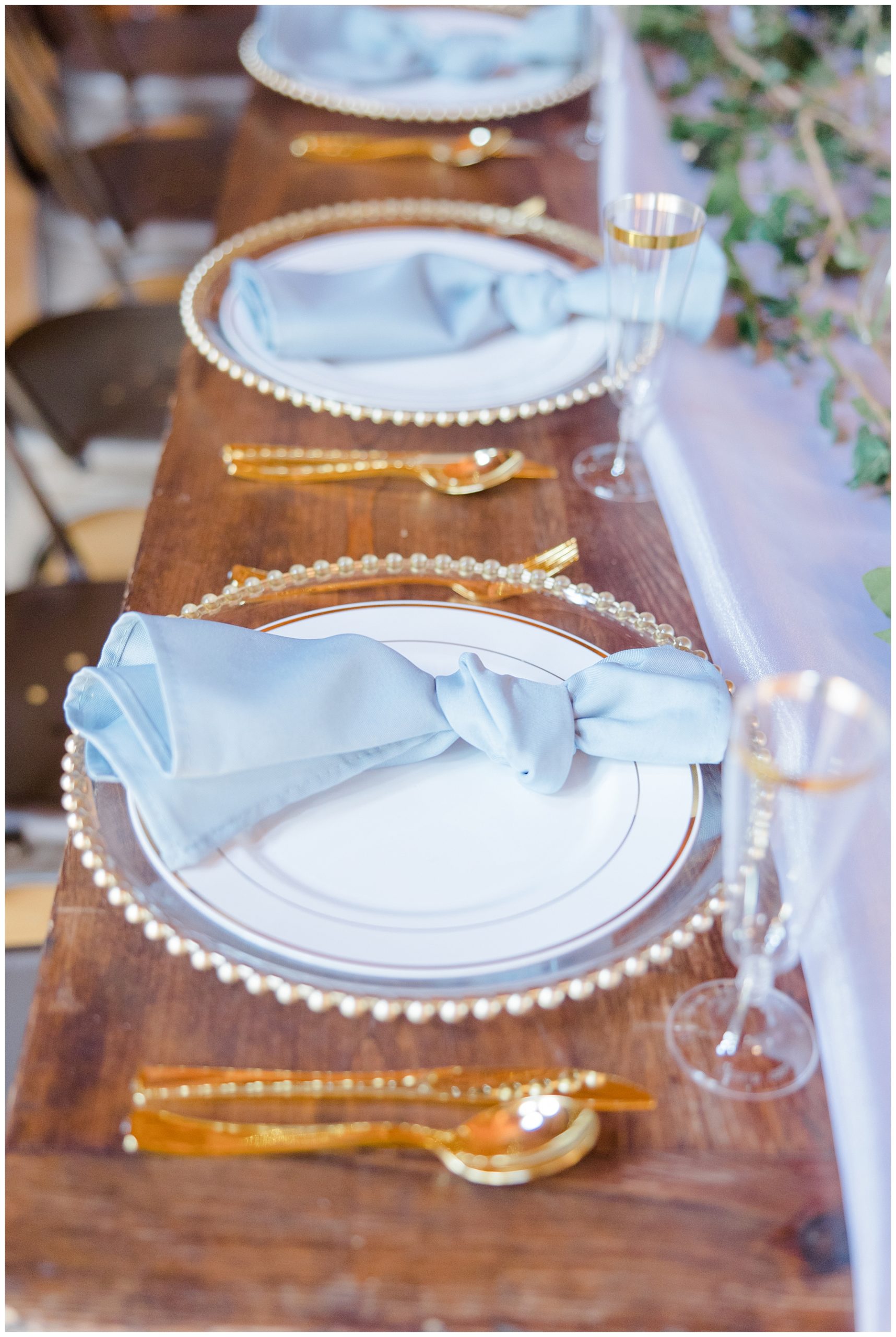 place settings at table during Elegant New Hampshire Wedding reception at The Barn at Powder Major's Farm