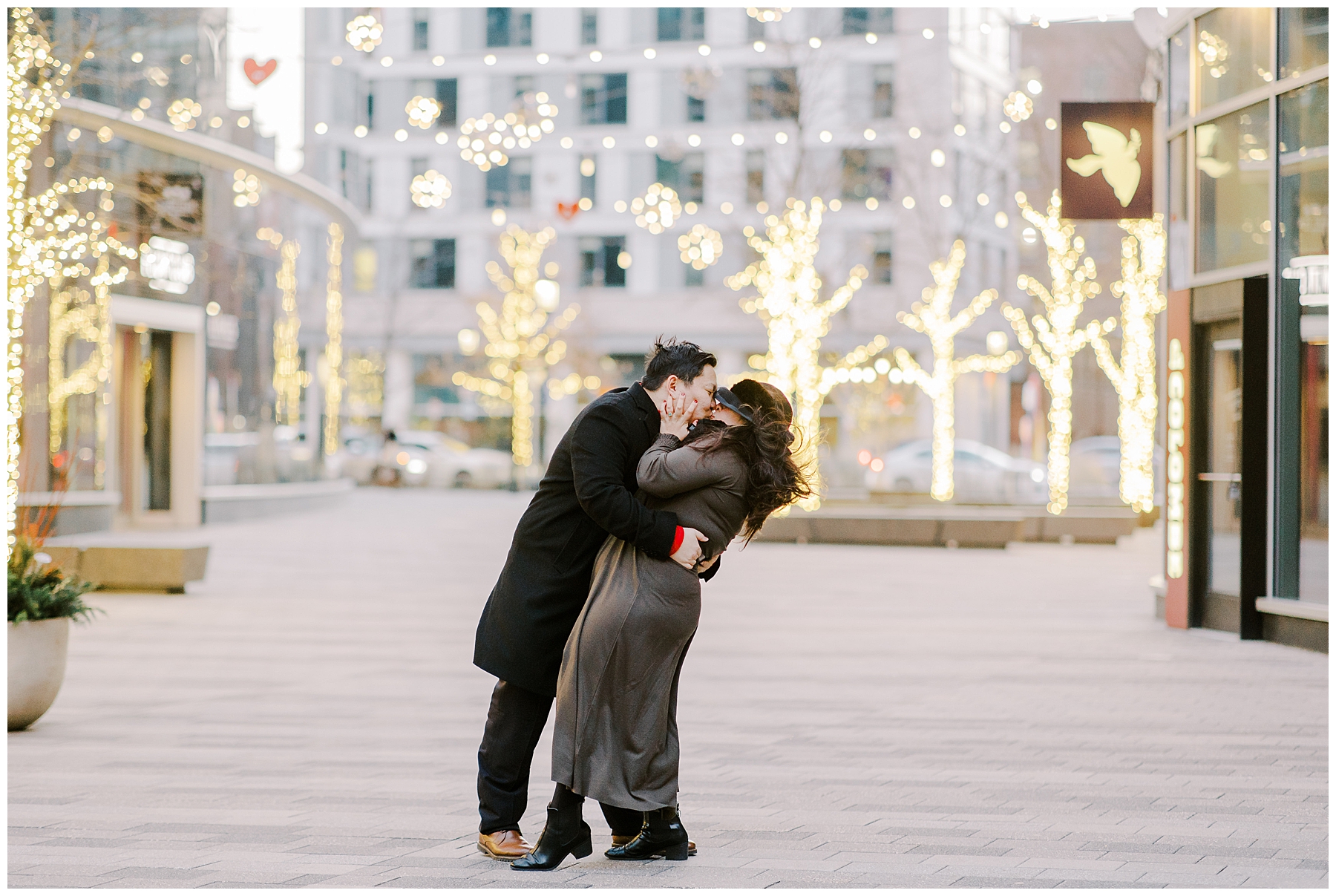 couple kiss in downtown Boston after surprise proposal 