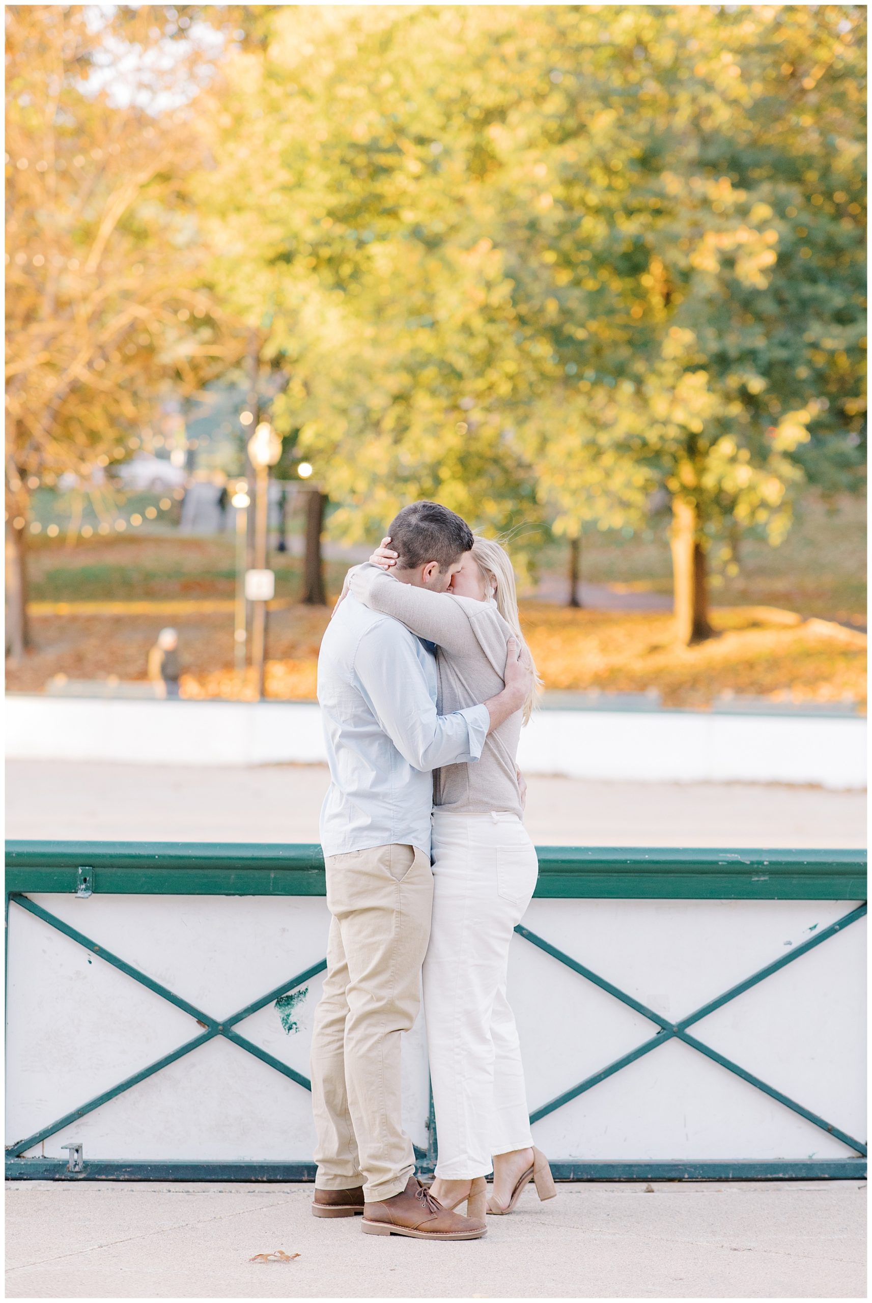 couple kiss on bridge in Boston 