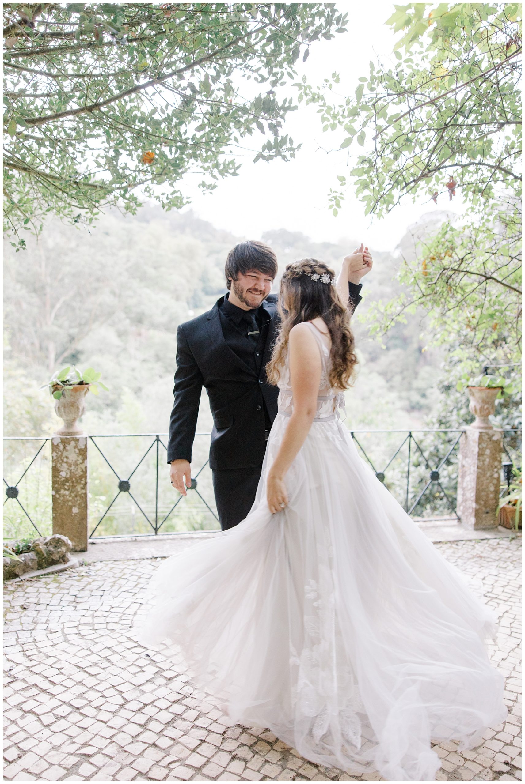 newlyweds dancing on balcony after Intimate Portugal Wedding at Casa de Paderna 