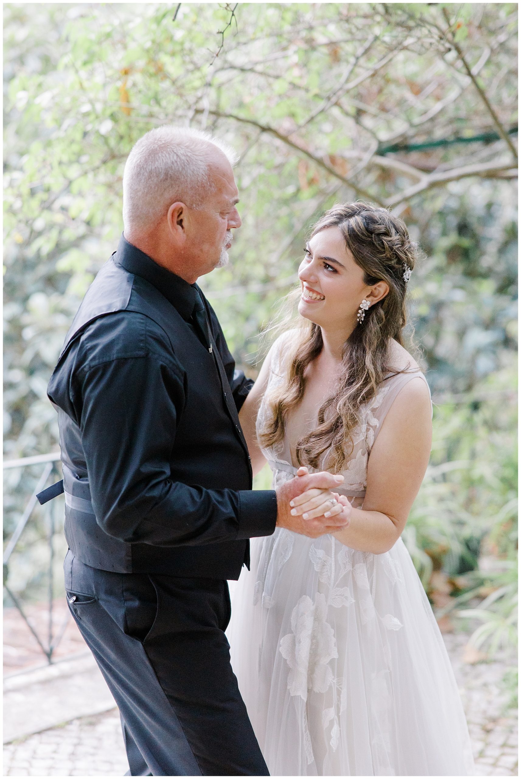 bride dances with her father after wedding 