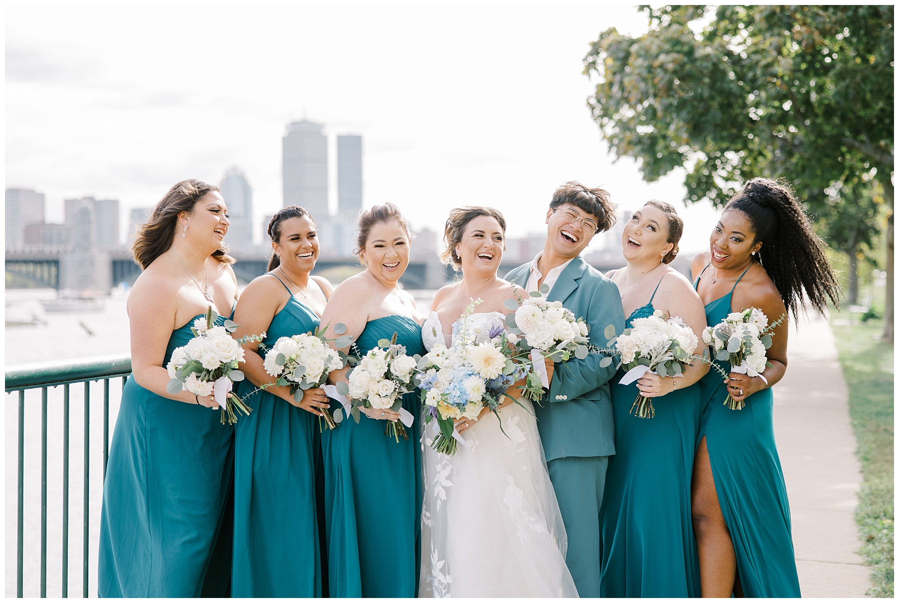 bride and bridesmaids in Peacock dresses
