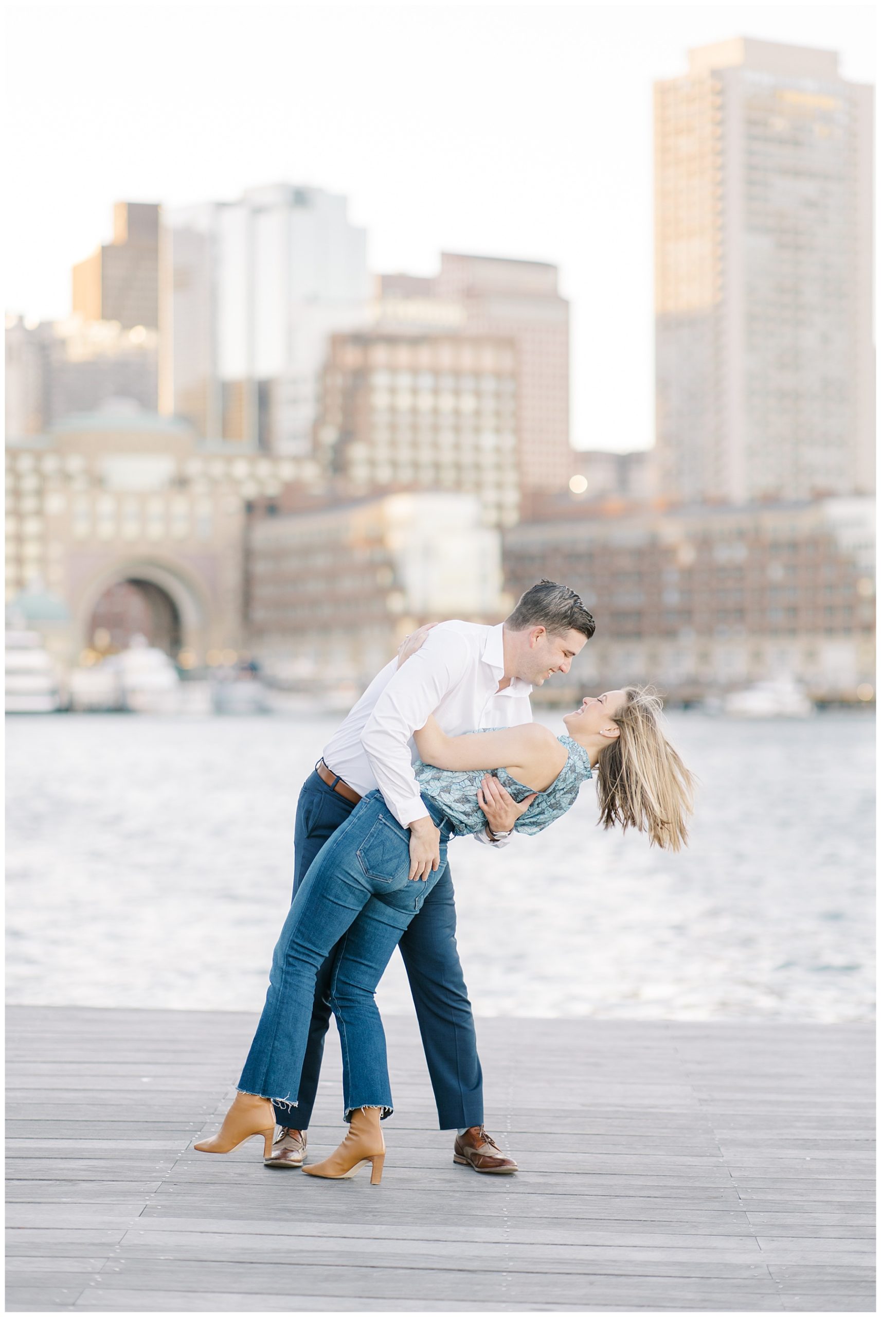 guy dips fiance during engagement session