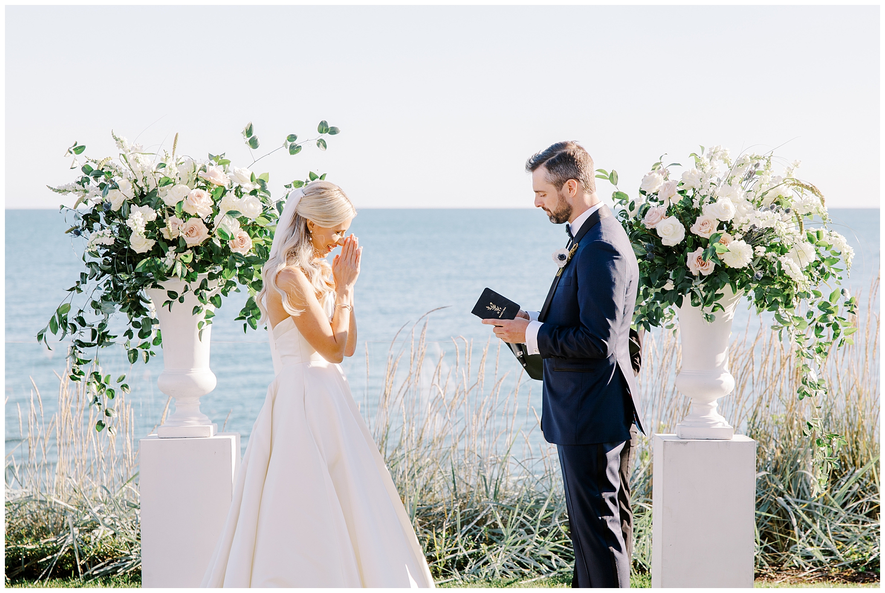 couple exchange vows during Coastal Cape Cod Wedding at Pelham House Resort