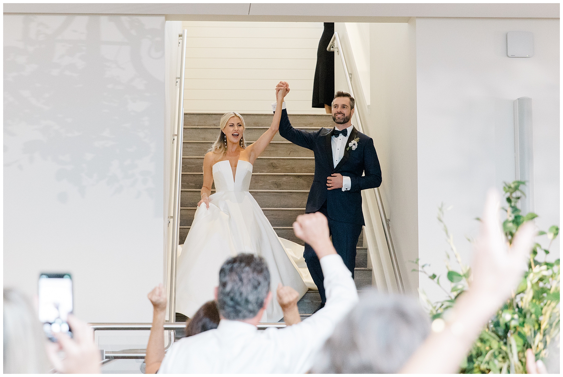 newlyweds grand entrance to reception at Pelham House Resort
