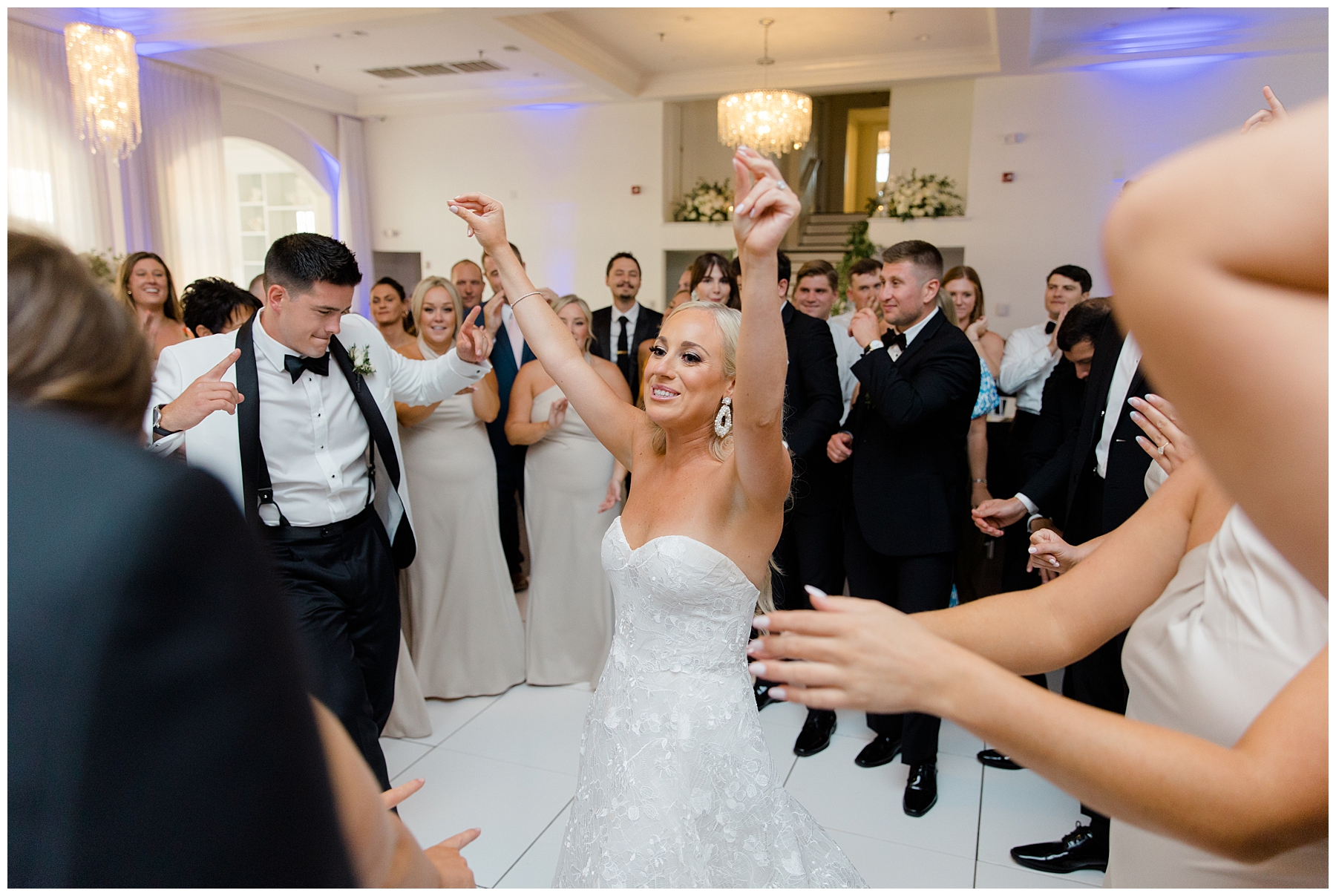 bride dances as she enters reception 