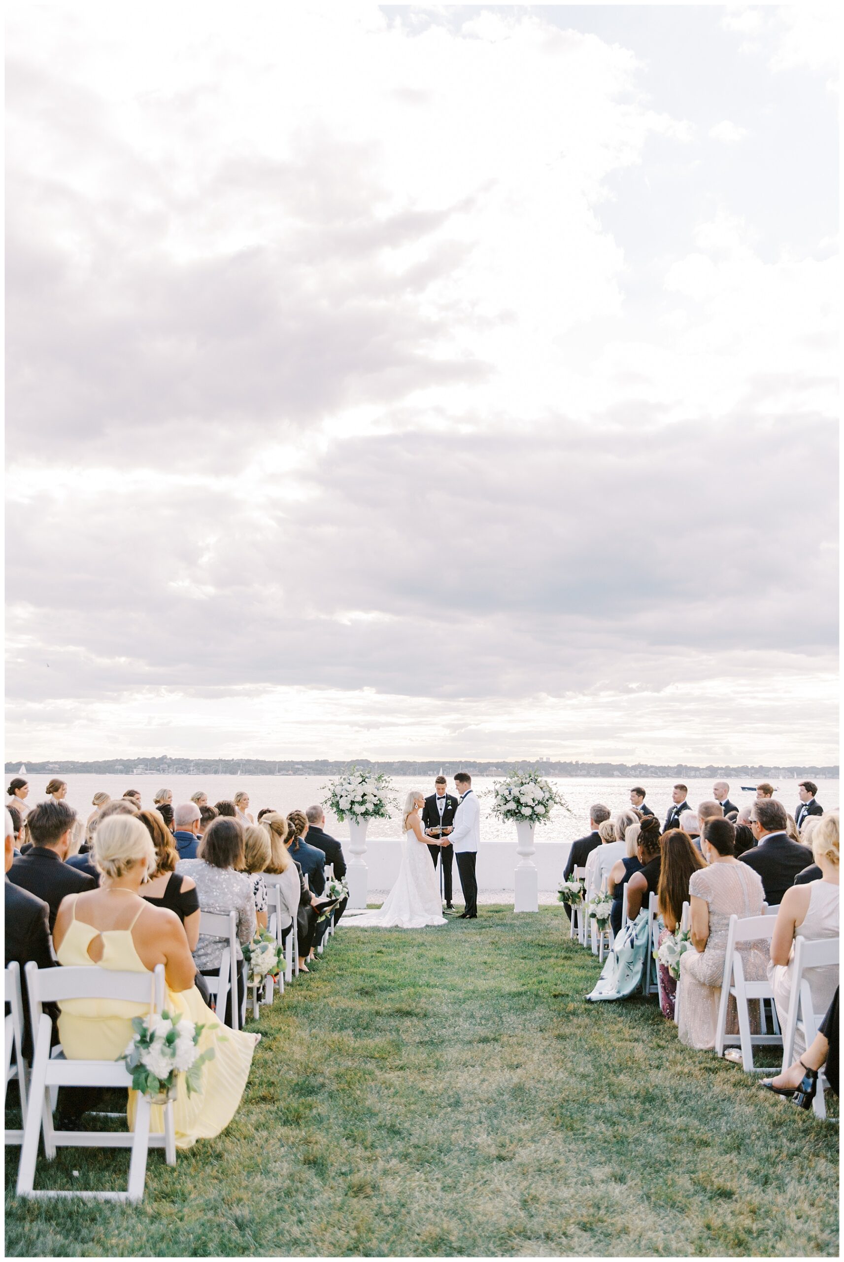 outdoor waterfront wedding ceremony at Elegant Belle Mer
