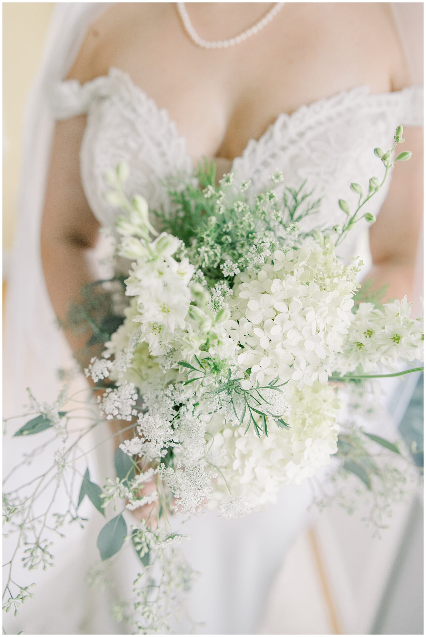 white flower wedding bouquet with greenery