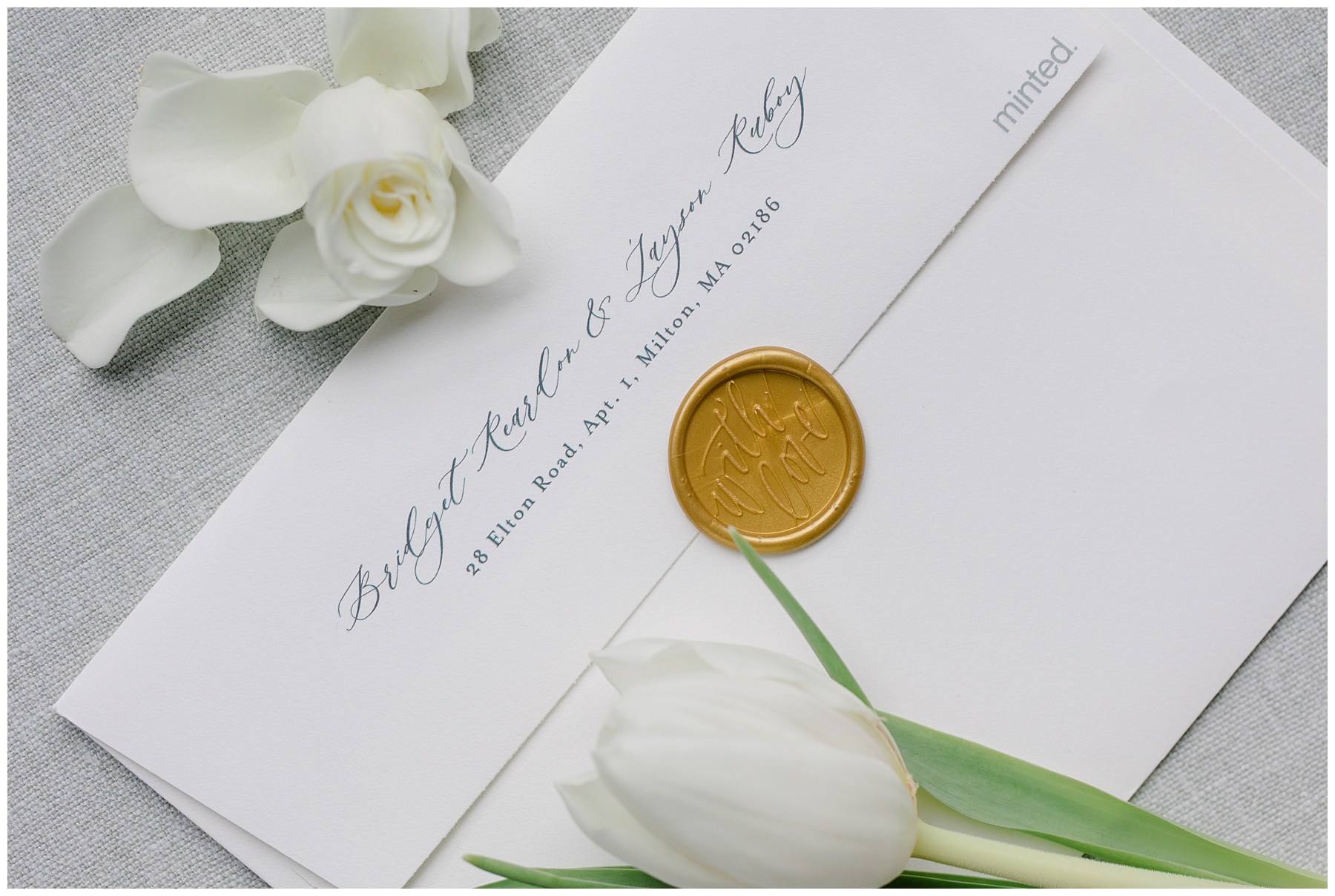 gold sealed envelope from Elegant Lakeview Pavilion Wedding 