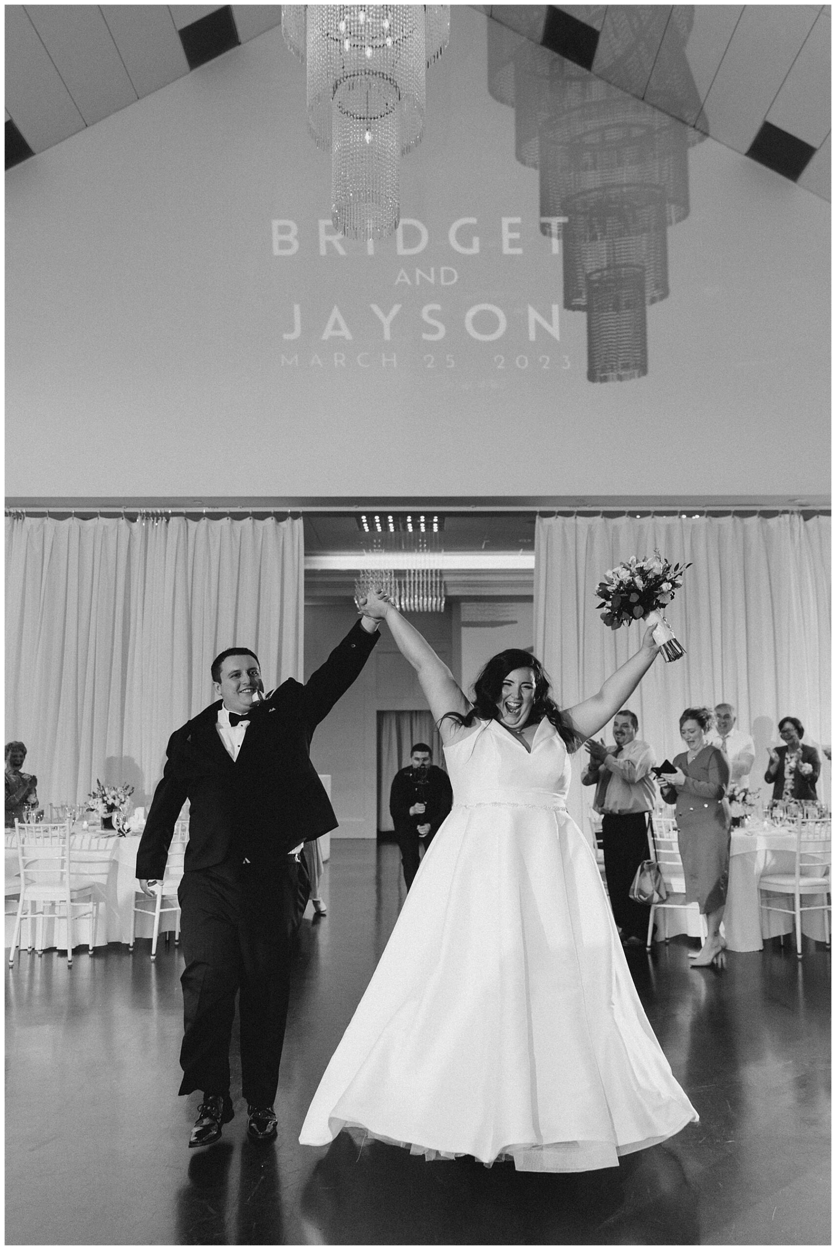 newlyweds enter wedding reception at Lakeview Pavilion in MA 