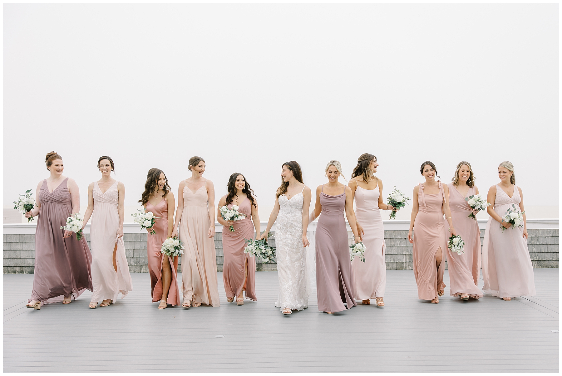 bride with bridesmaids from Wychmere Beach Club Wedding in Cape Cod 