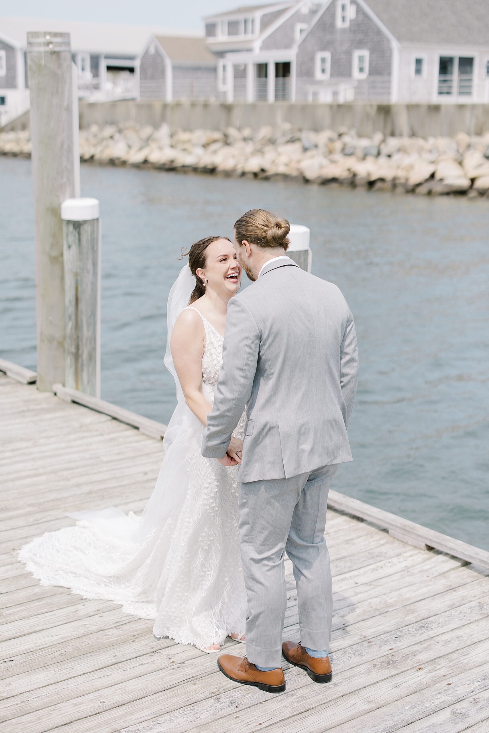 candid moment between bride and groom at Cape Cod Wedding