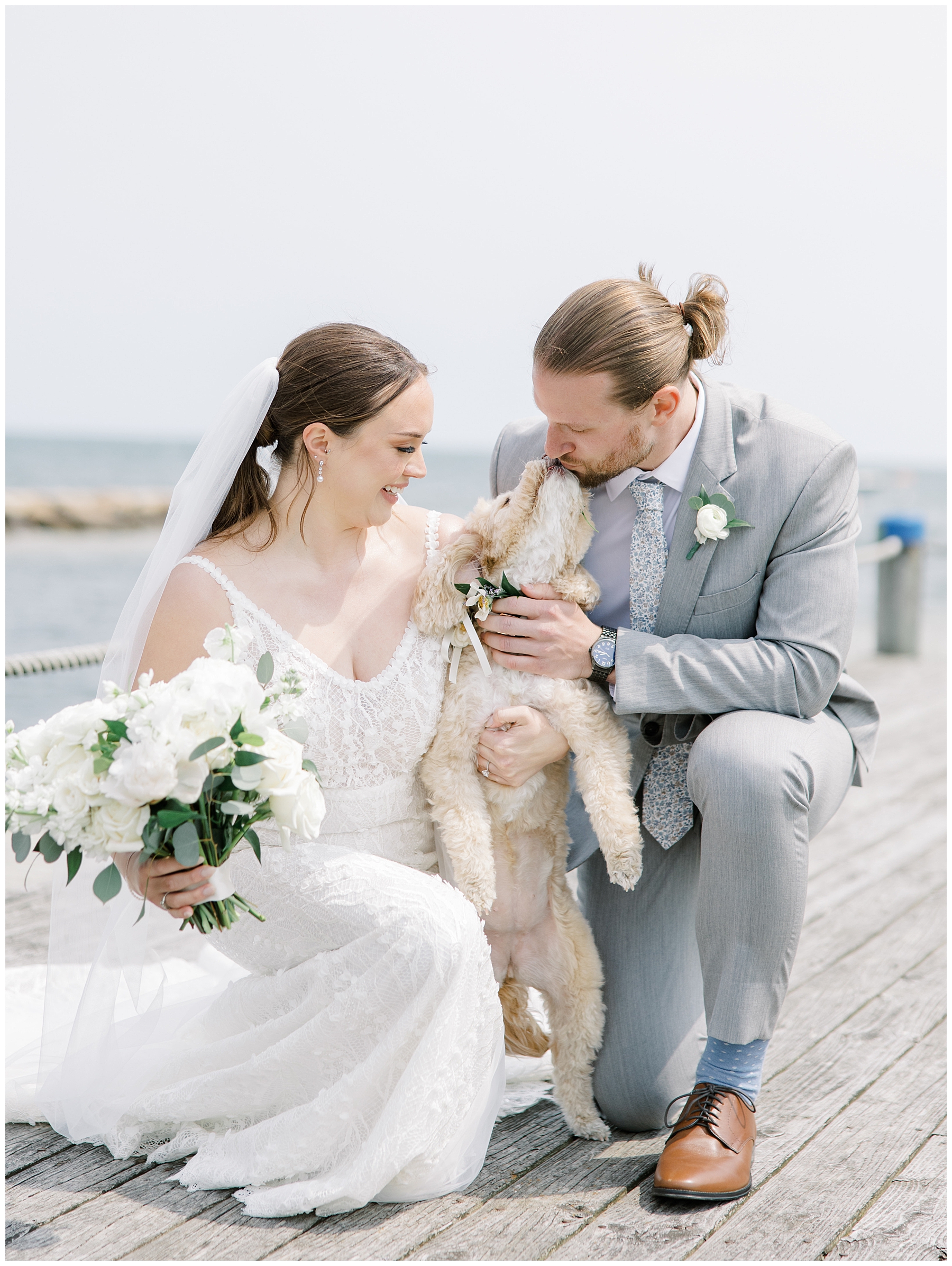 bride and groom portaits with their sweet dog 