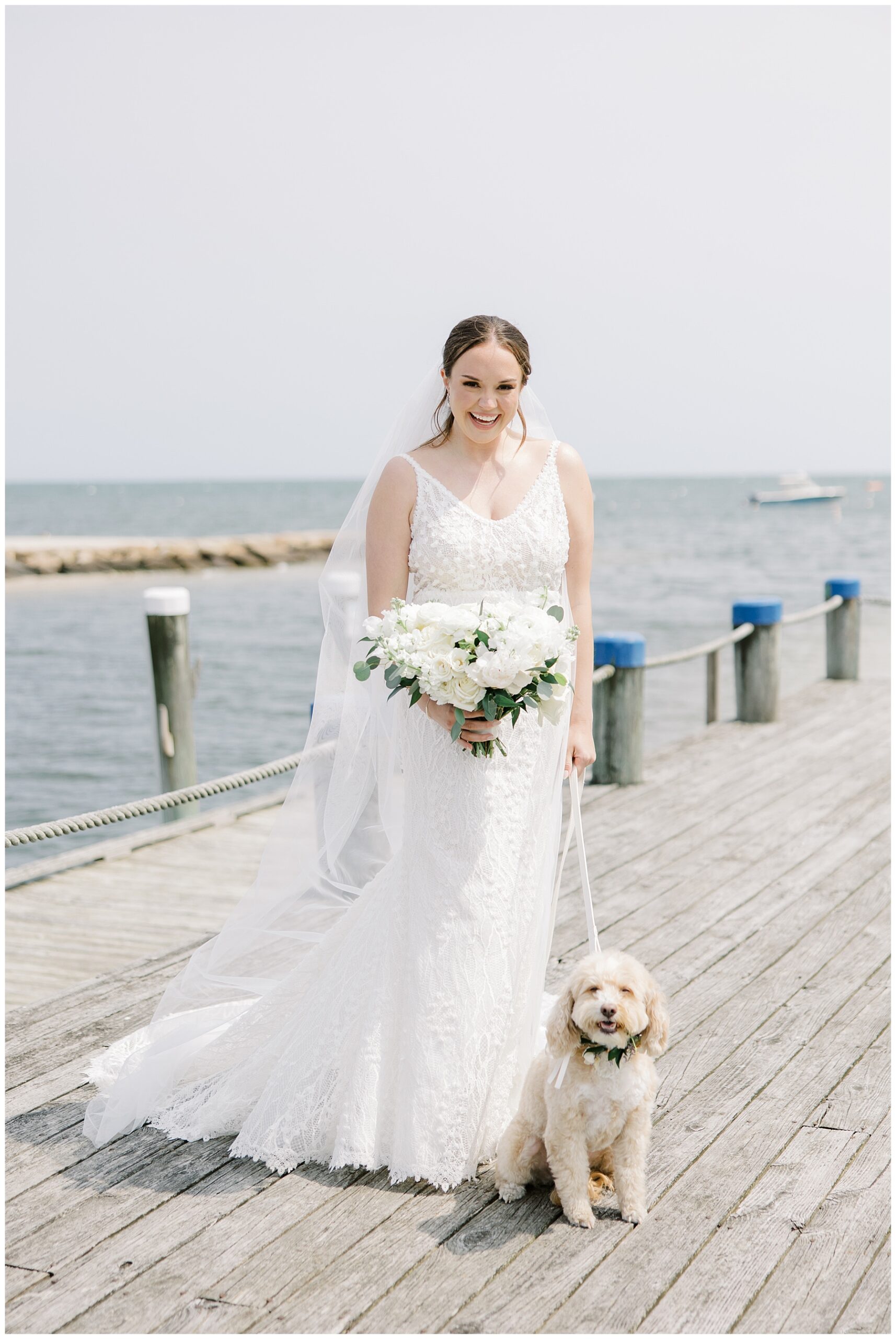 bride with her dog on her wedding day