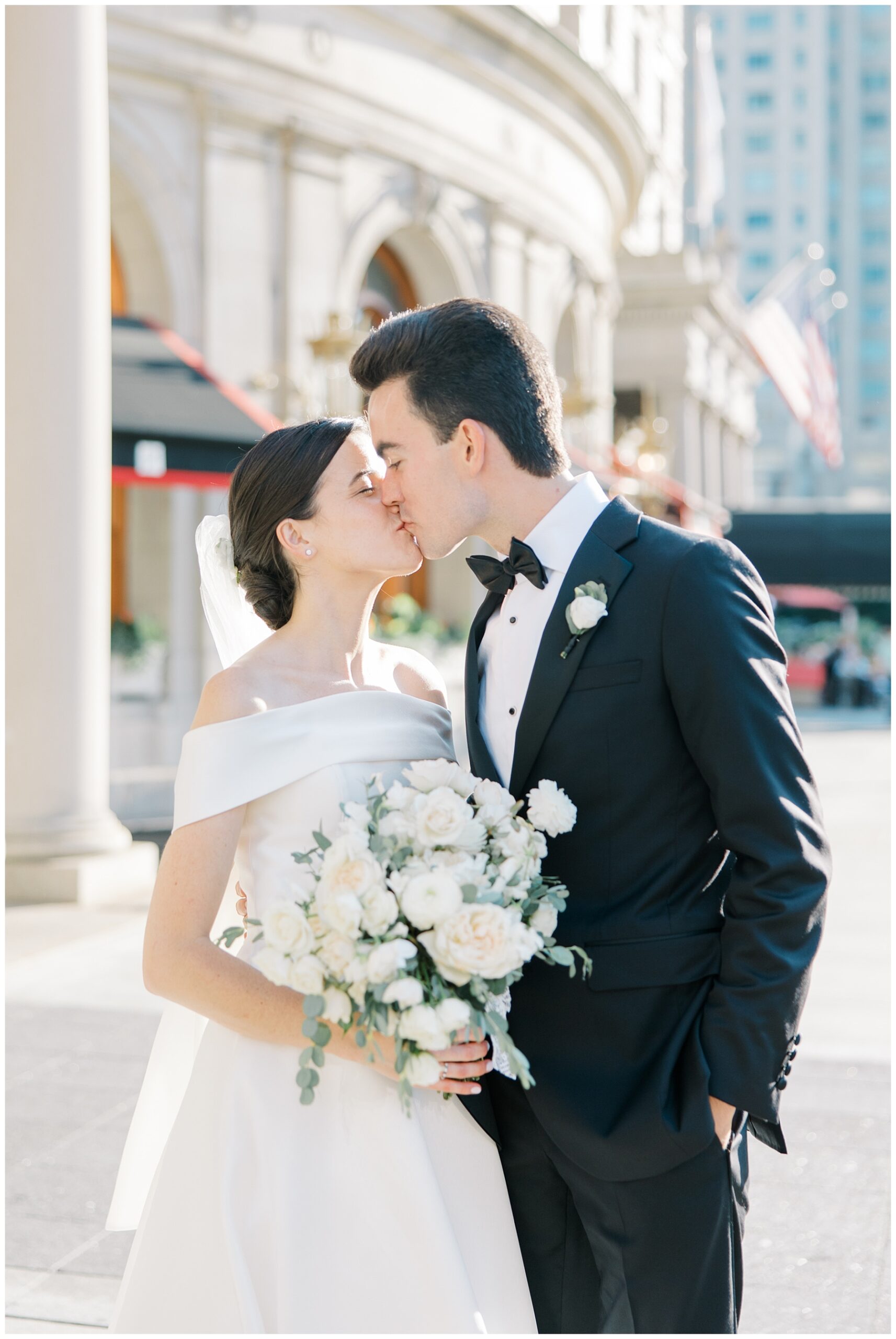 newlyweds kiss on Boston street 