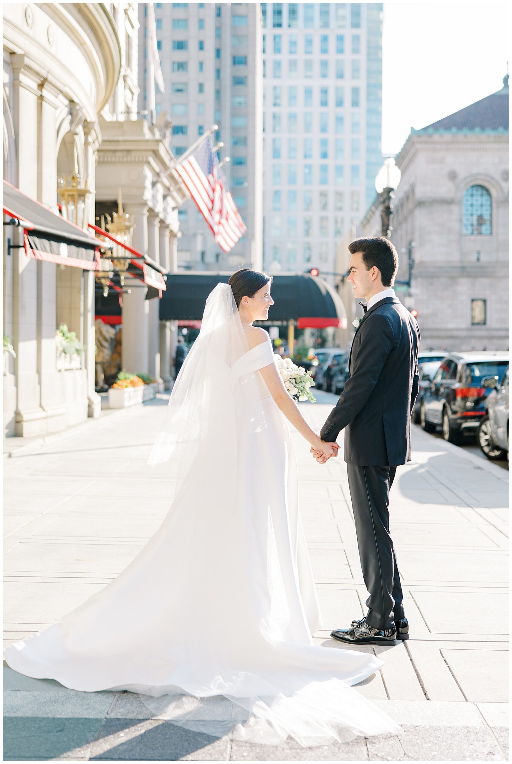 newlyweds outside of Luxury Boston Wedding venue at Fairmont Copley Plaza