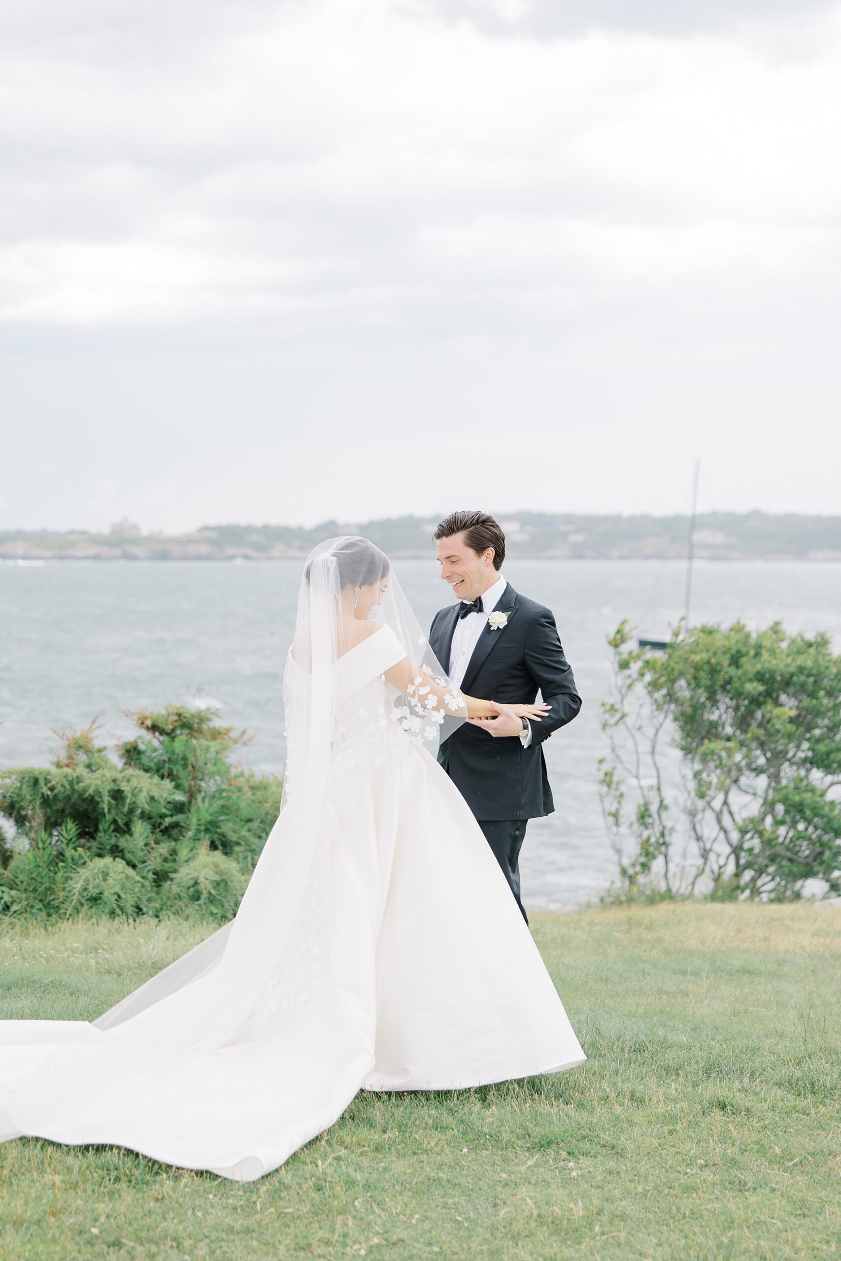 candid first look moment from Newport wedding at Castle Hill Inn 