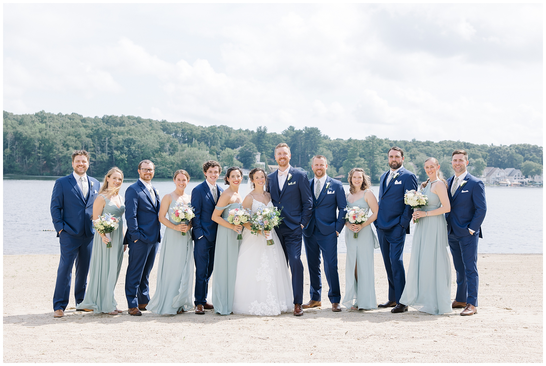 wedding party portraits by the water 