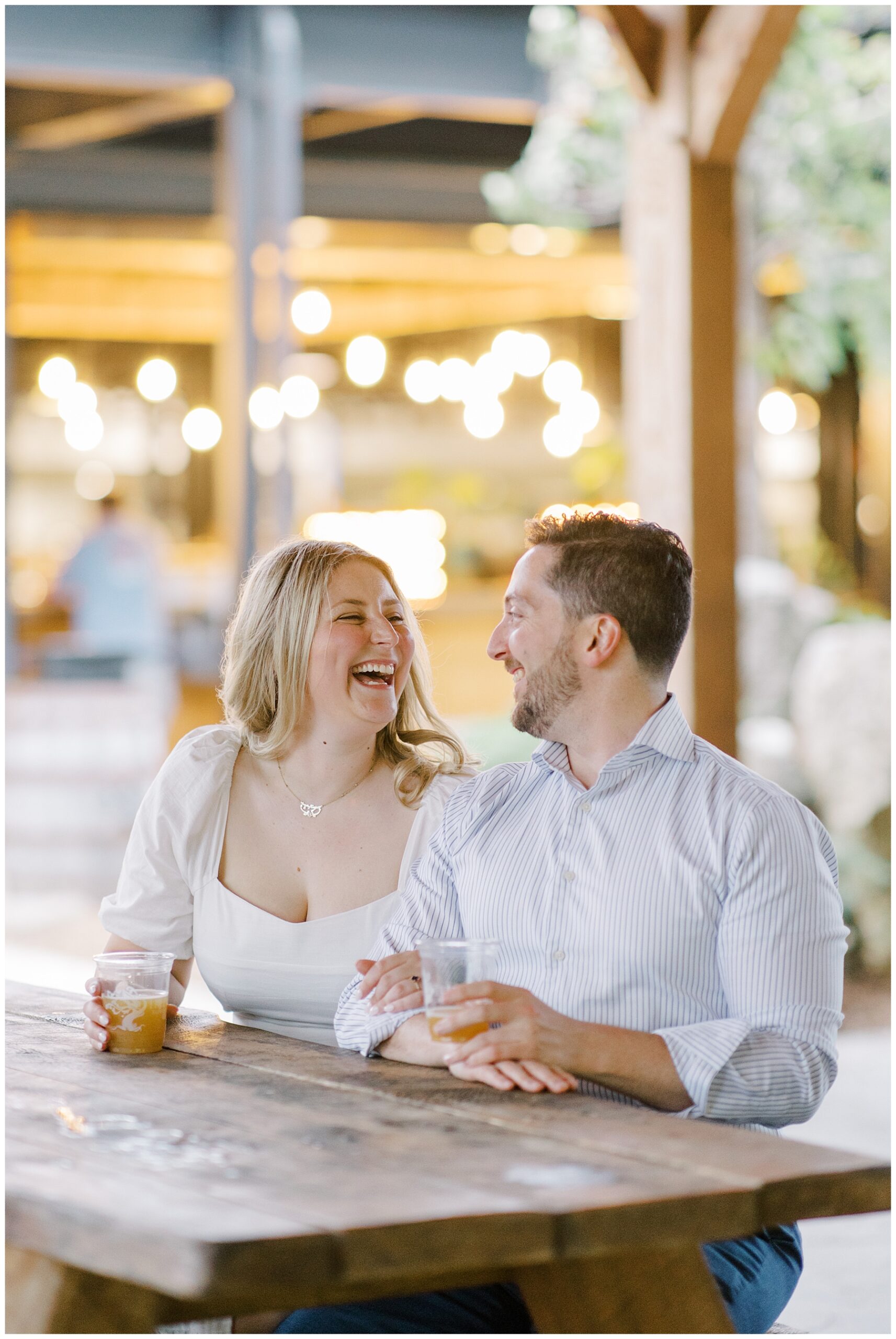 candid engagement portraits at Tree House Brewing Company