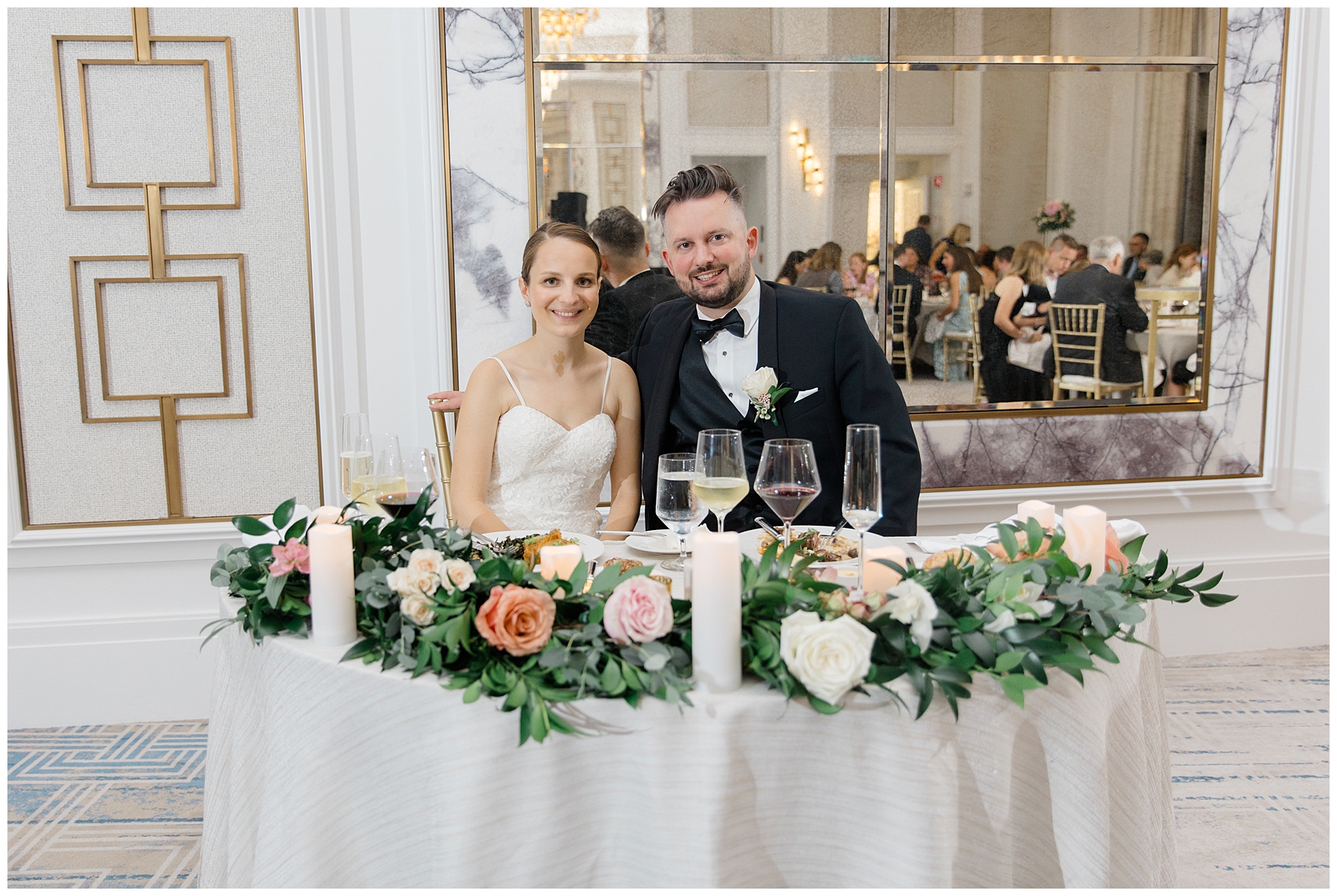 newlyweds at sweetheart table