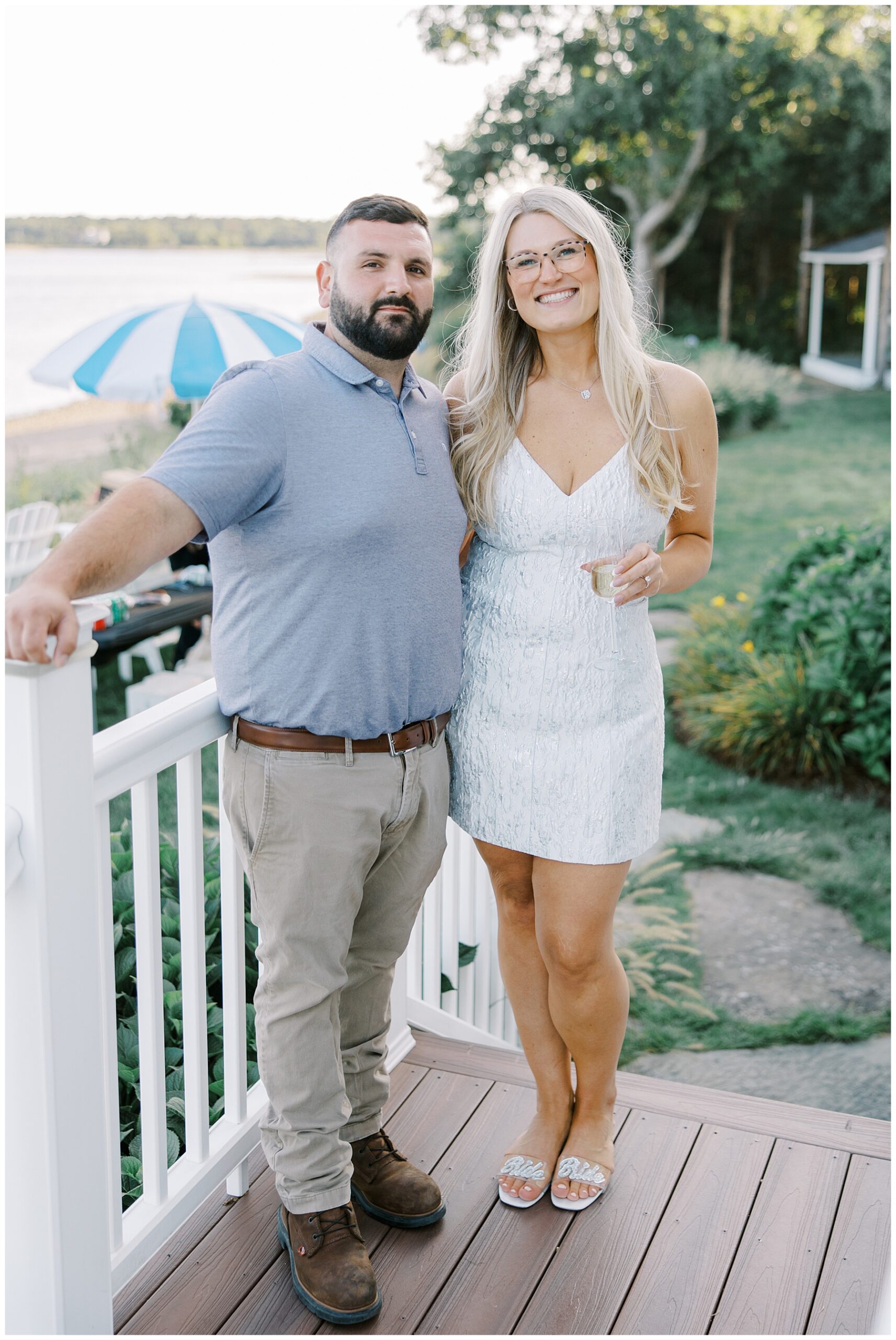 future bride and groom at welcome party at Dreamy Shining Tides Wedding venue on the Mattapoisett Harbor 