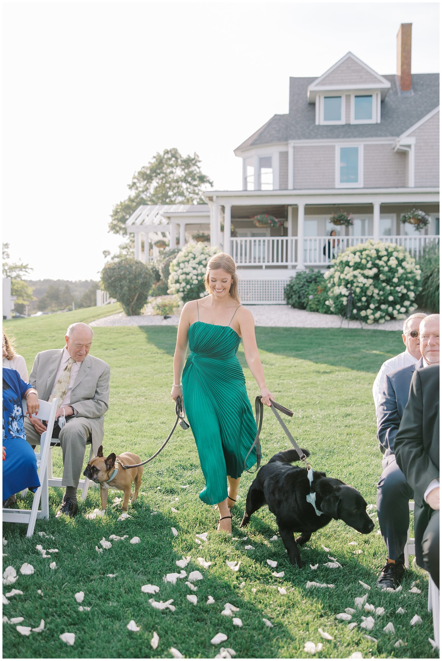 dogs escorted down aisle 