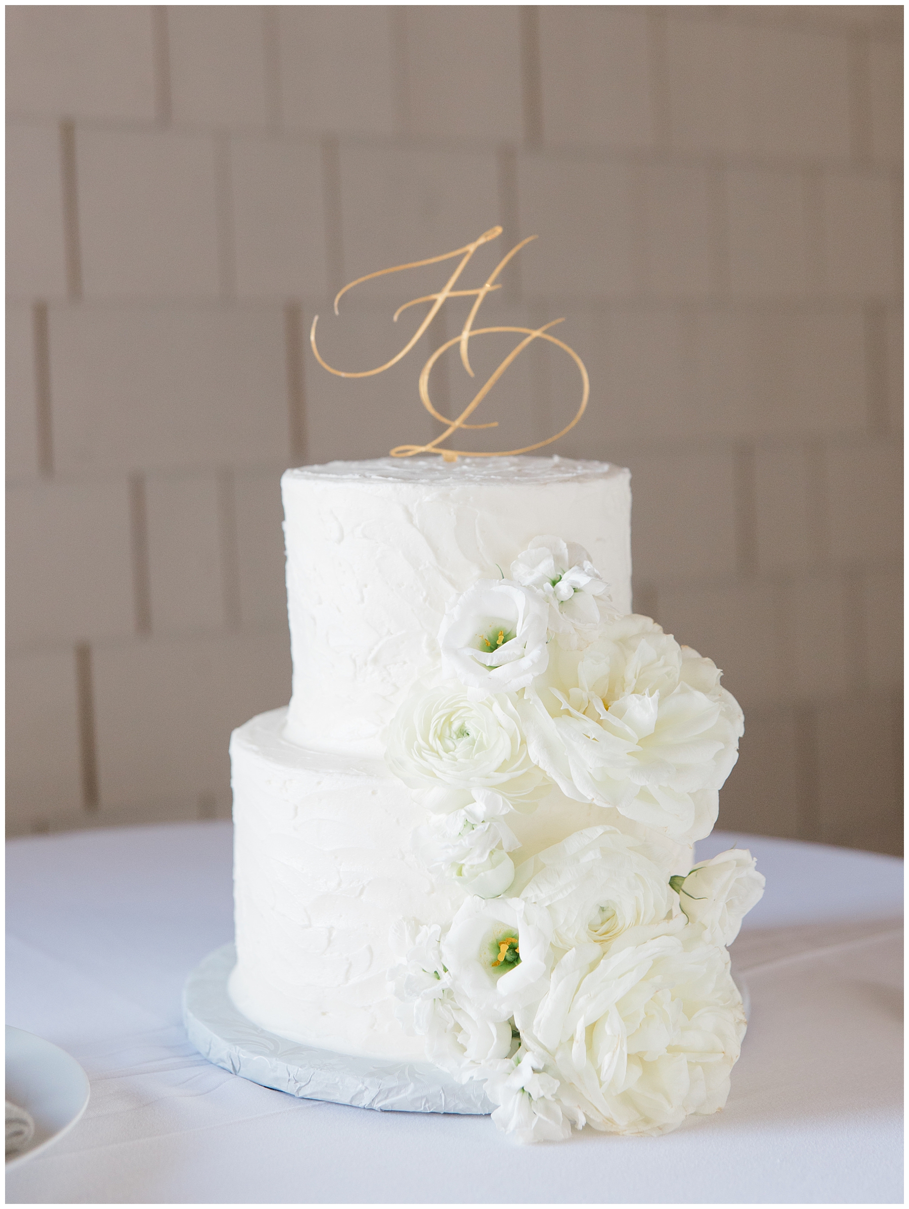 wedding cake decorated with white flowers