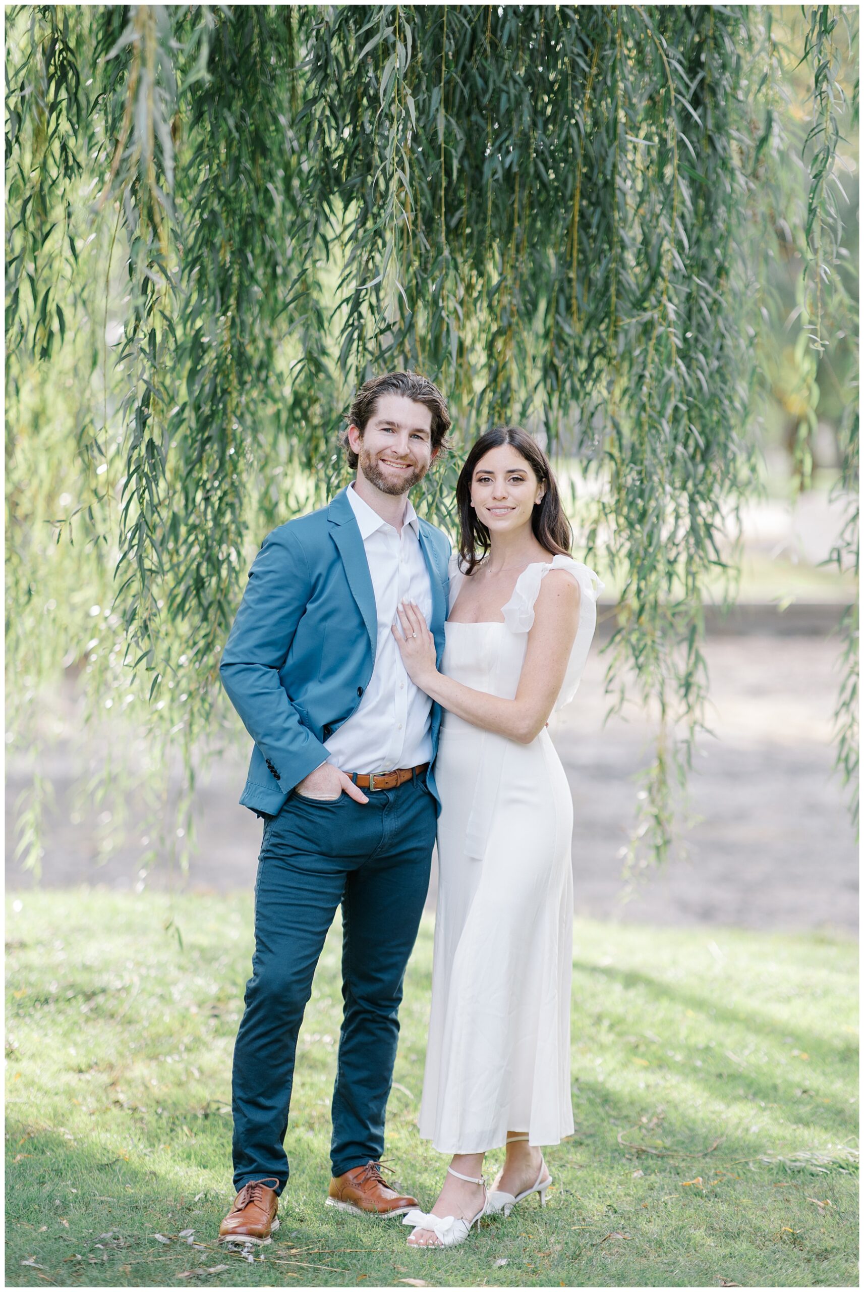 couple under weeping willow tree