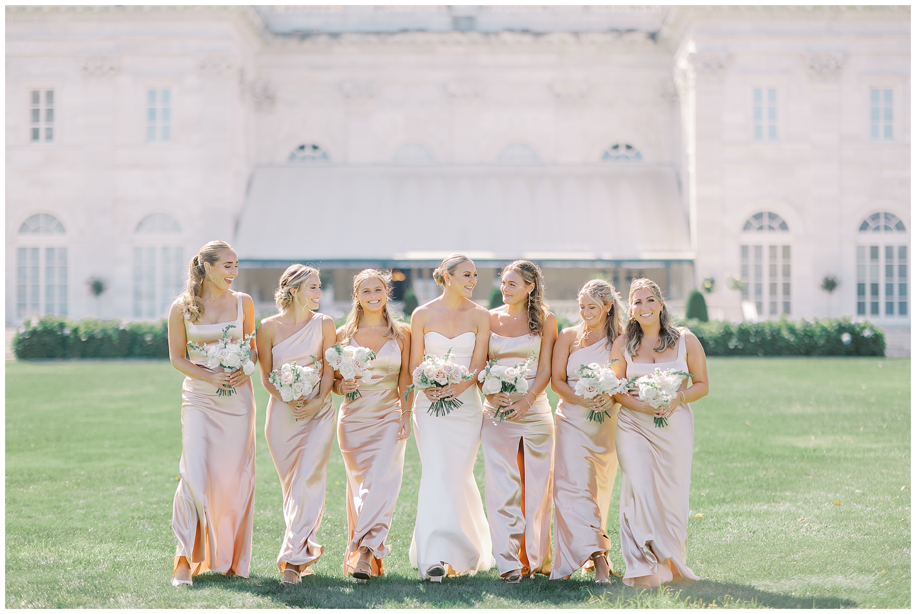 bridal party portraits on lawn of The Marble House