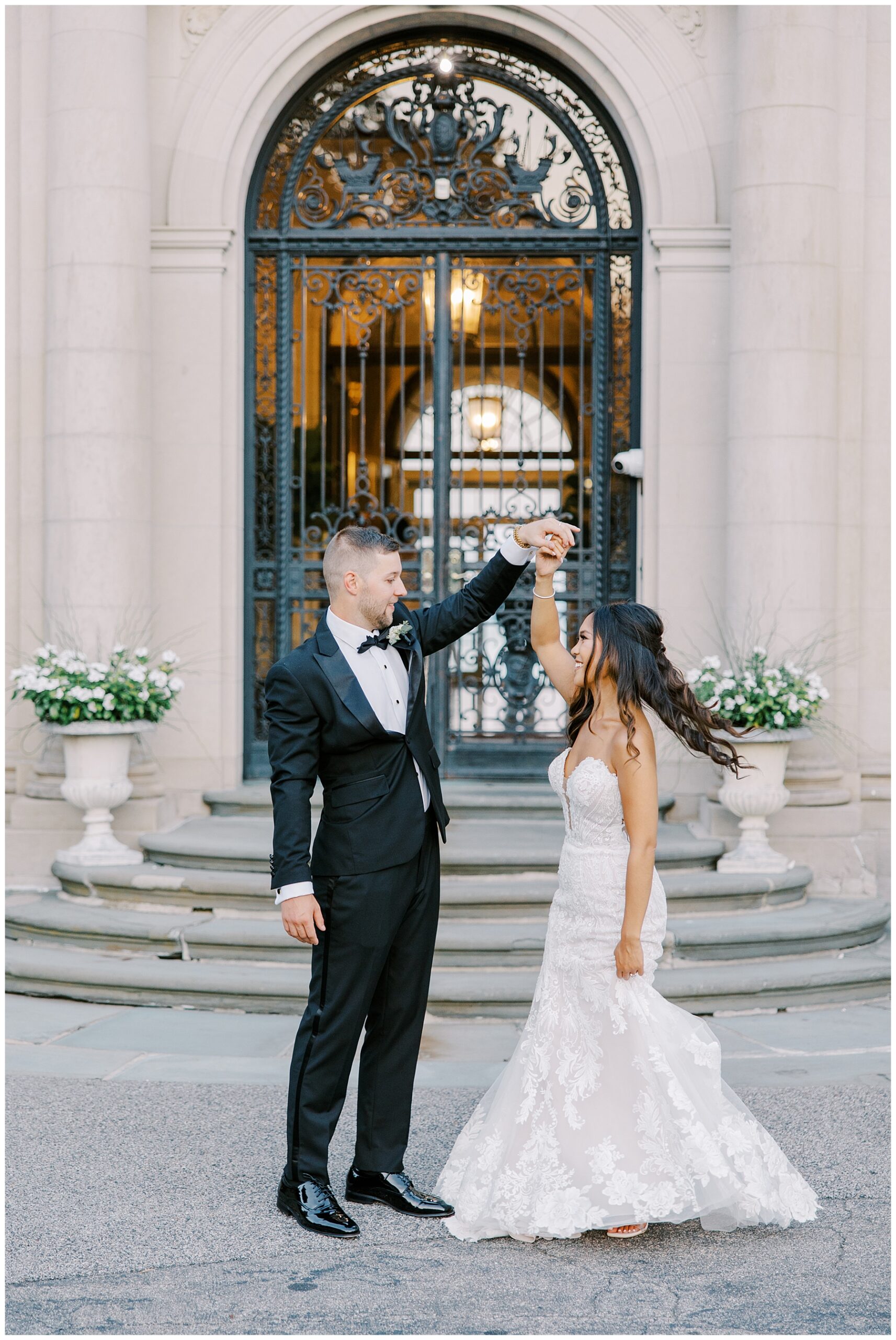 newlyweds dancing outside of Rhode Island Wedding venue at The Aldrich Mansion