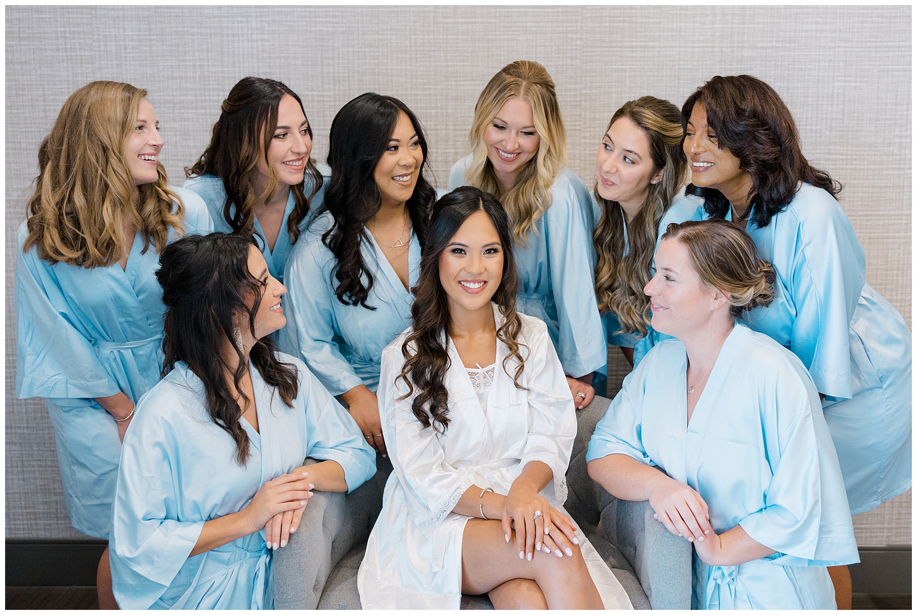 bridesmaids with bride in matching robes
