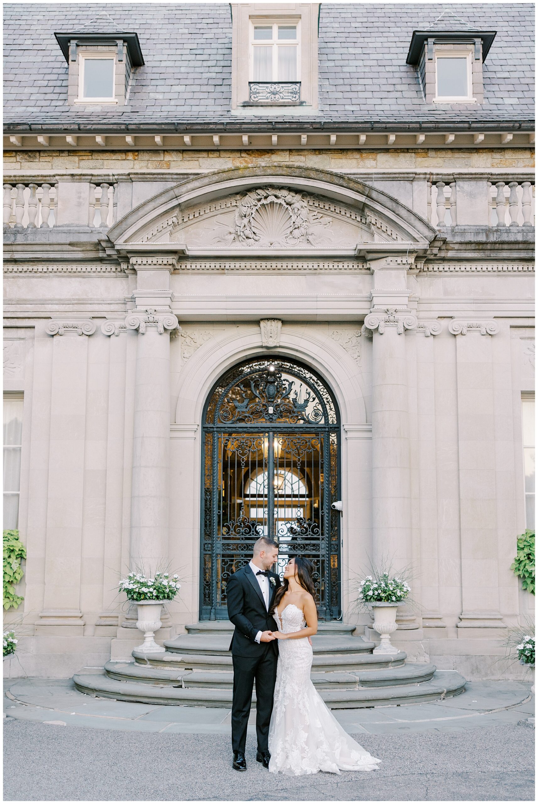 bride and groom in front of The Aldrich Mansion in Rhode Island