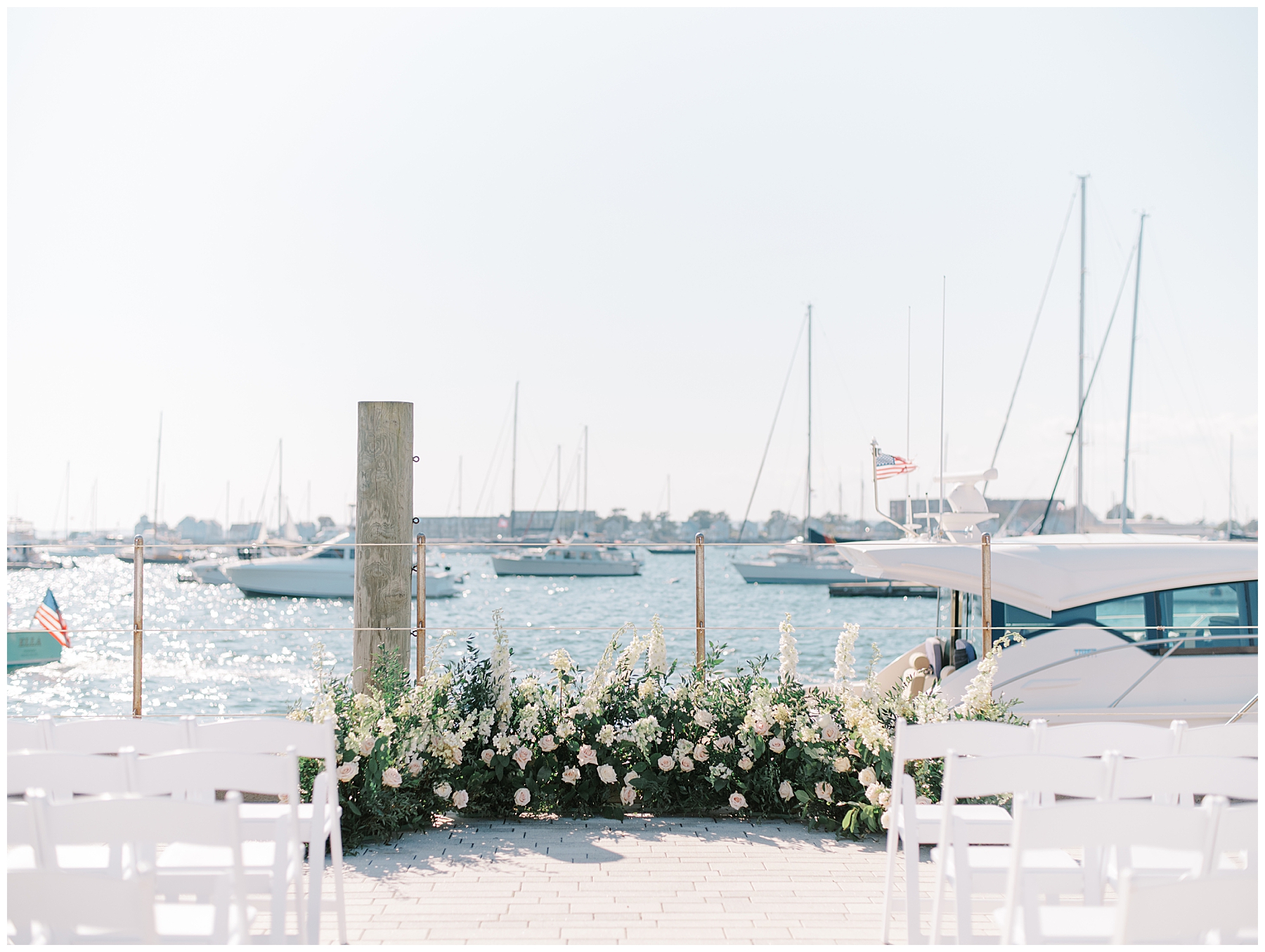 wedding ceremony florals on the dock 