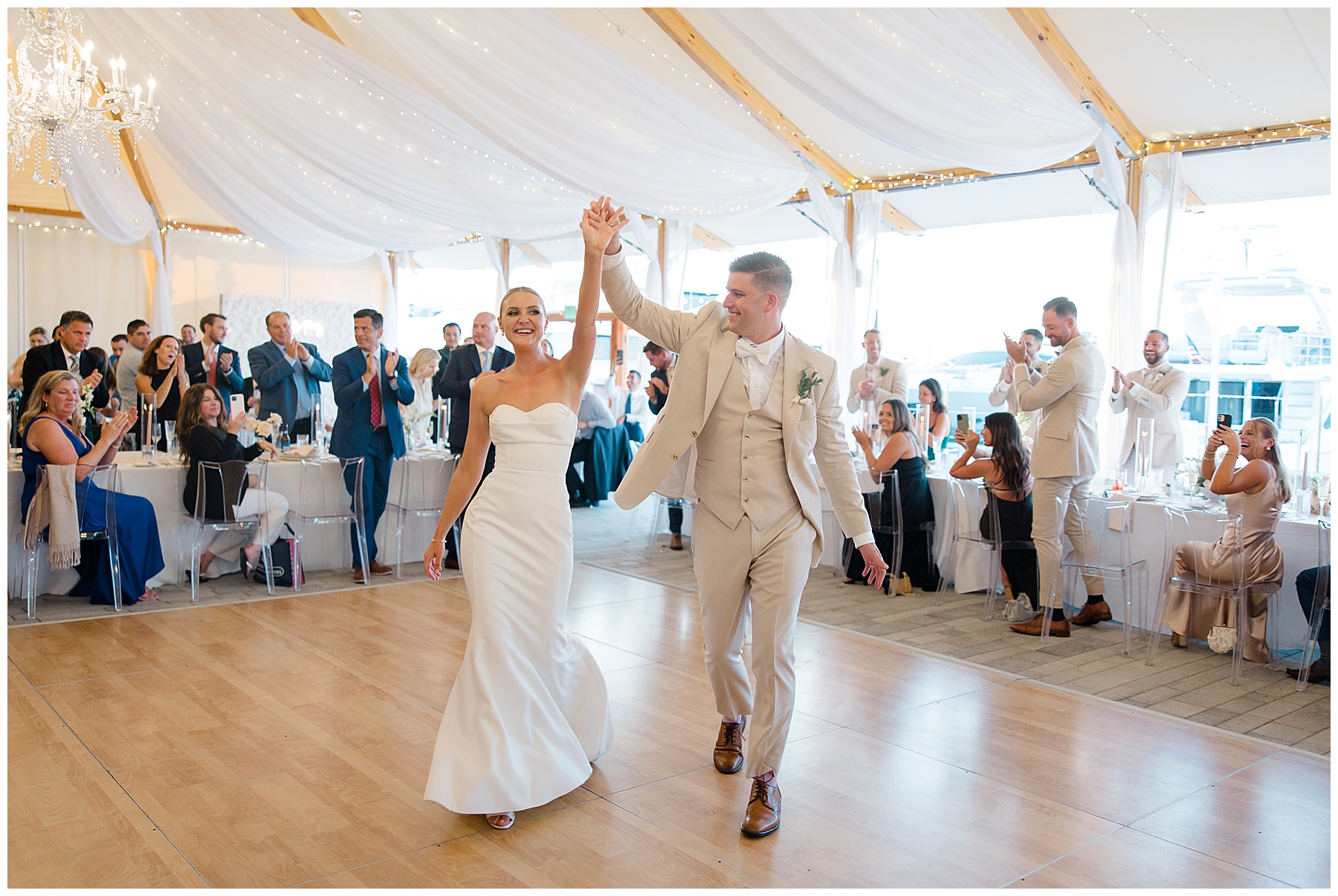 newlyweds enter the dance floor