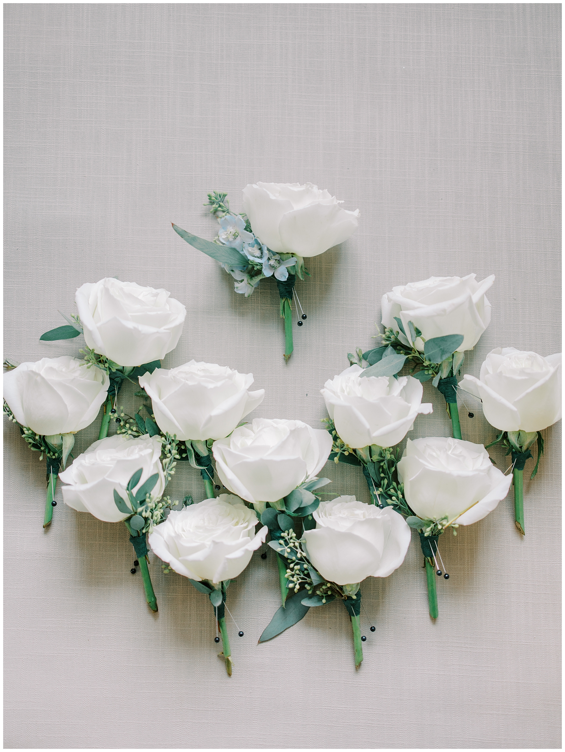 classic white boutonnieres 