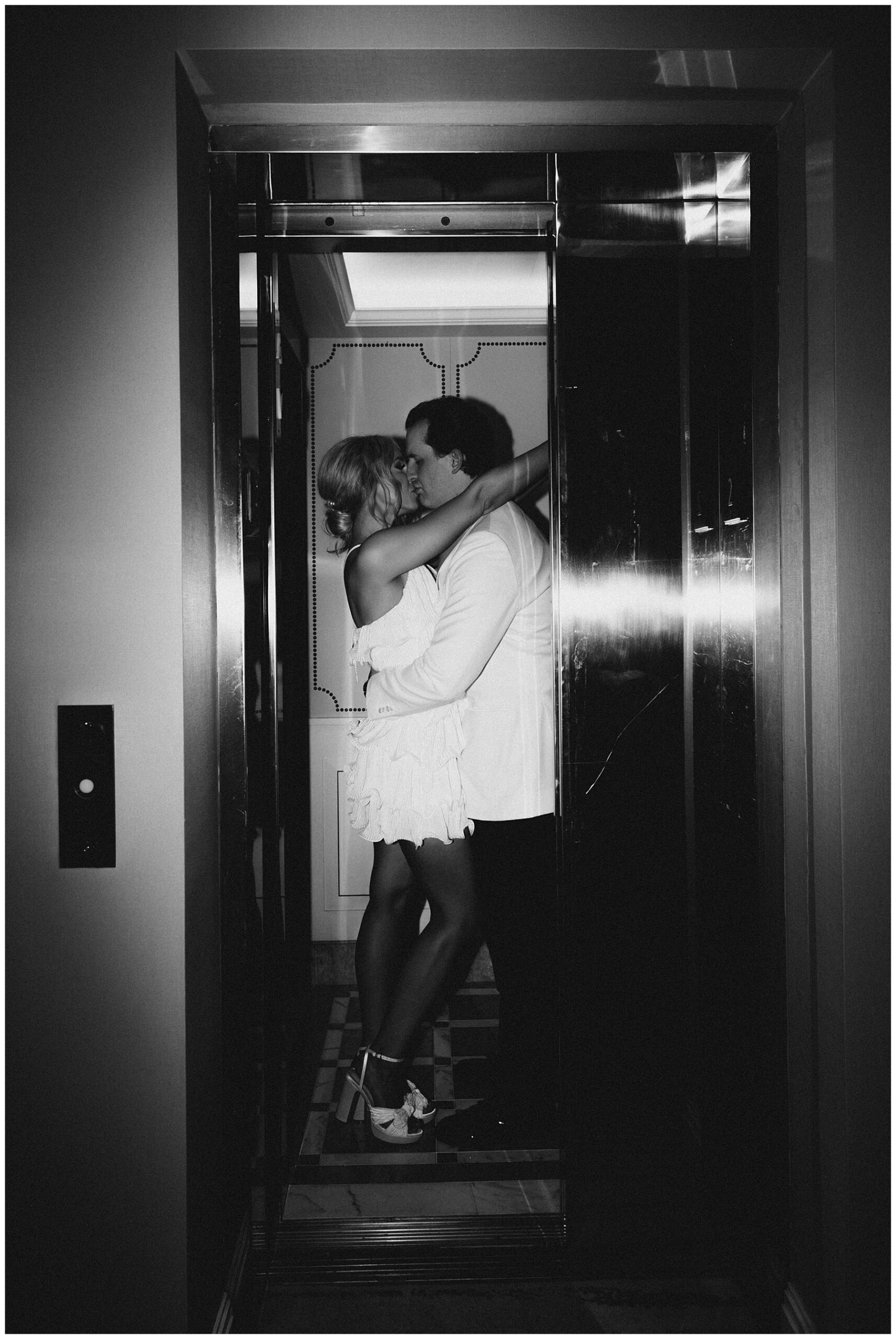 timeless wedding photos of newlyweds kissing in the elevator