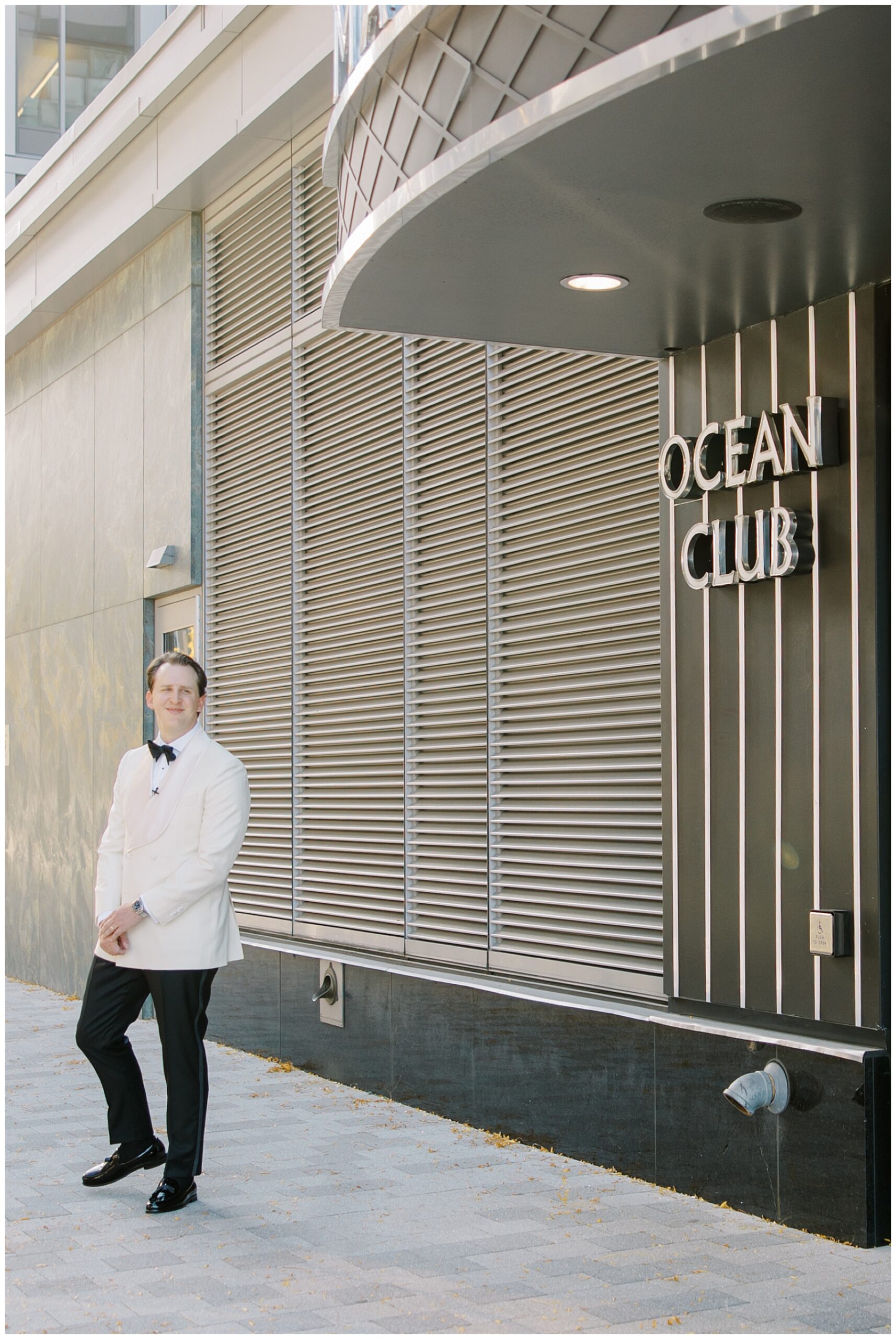 groom outside of Ocean Club for first look